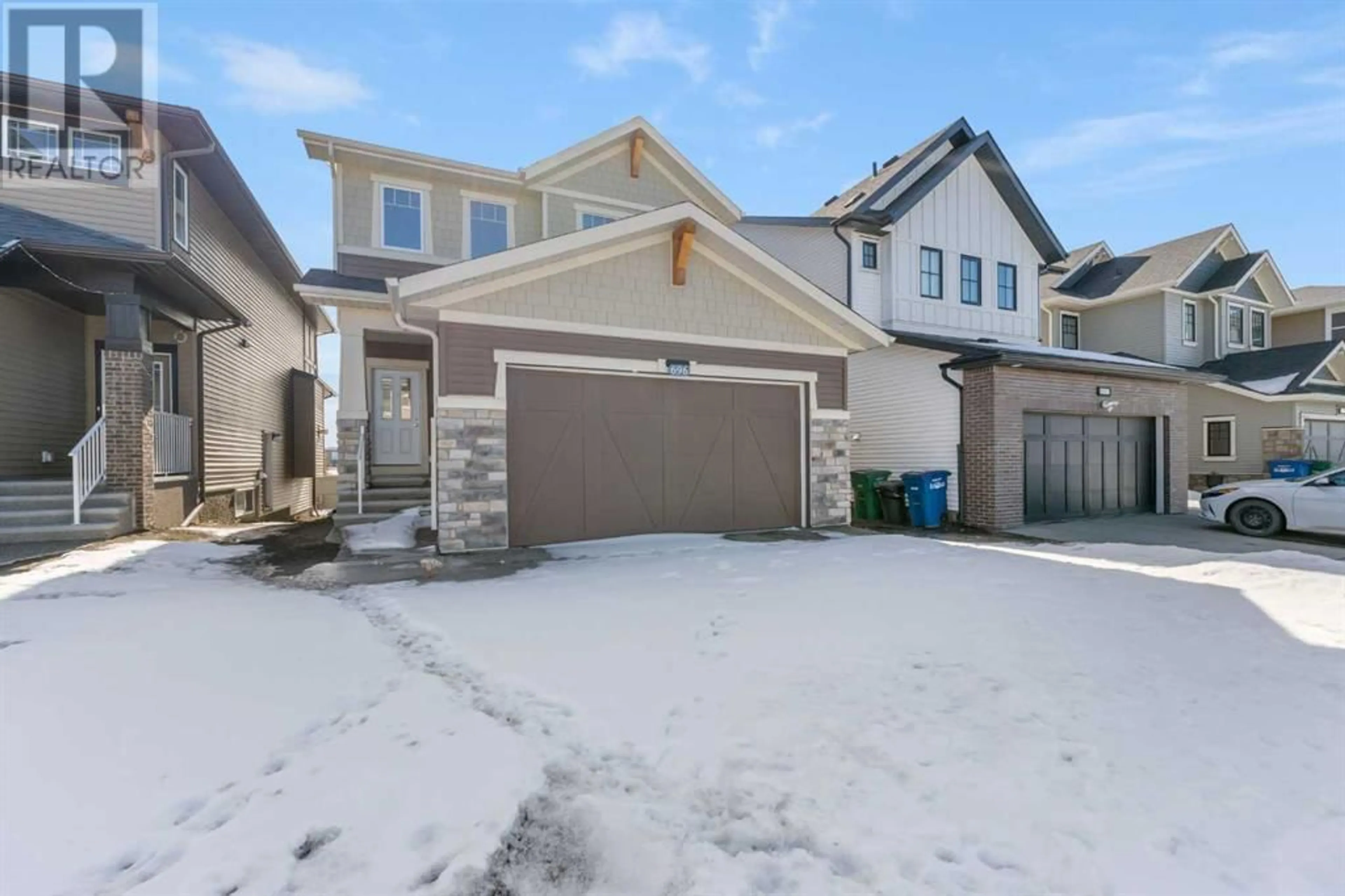 Frontside or backside of a home for 696 Reynolds Crescent SW, Airdrie Alberta T4B4B2