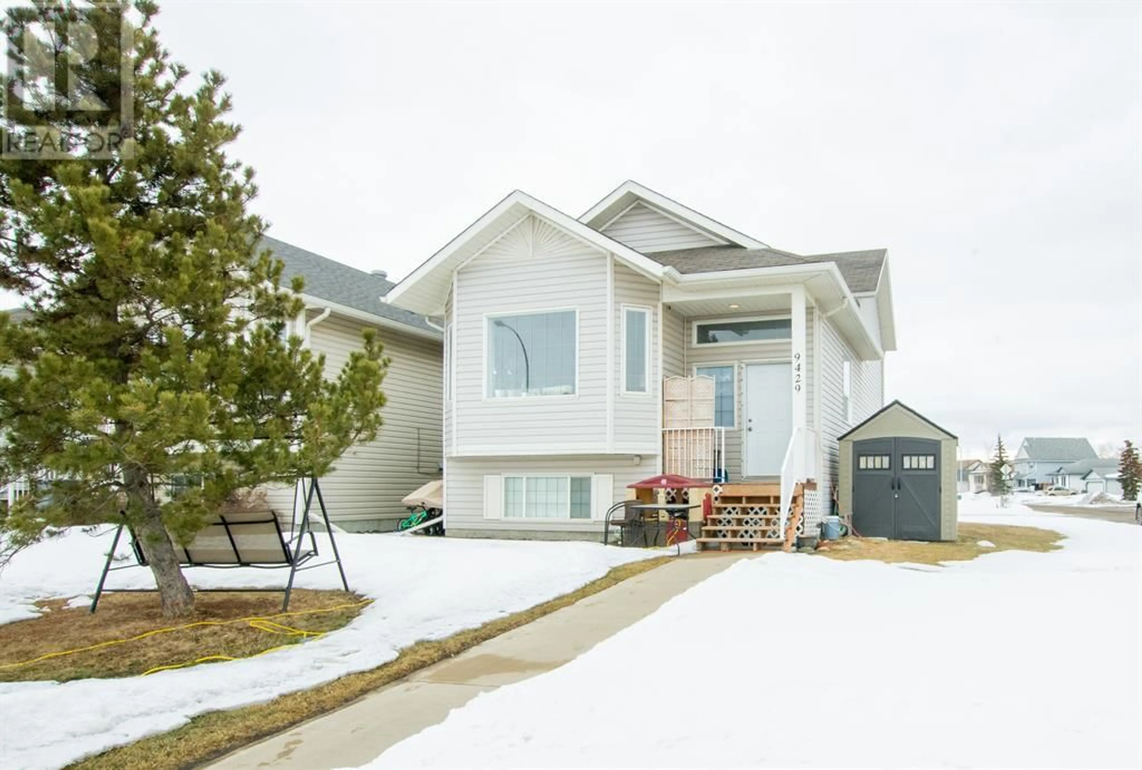 Frontside or backside of a home for 9429 129 Avenue, Grande Prairie Alberta T8X1R4