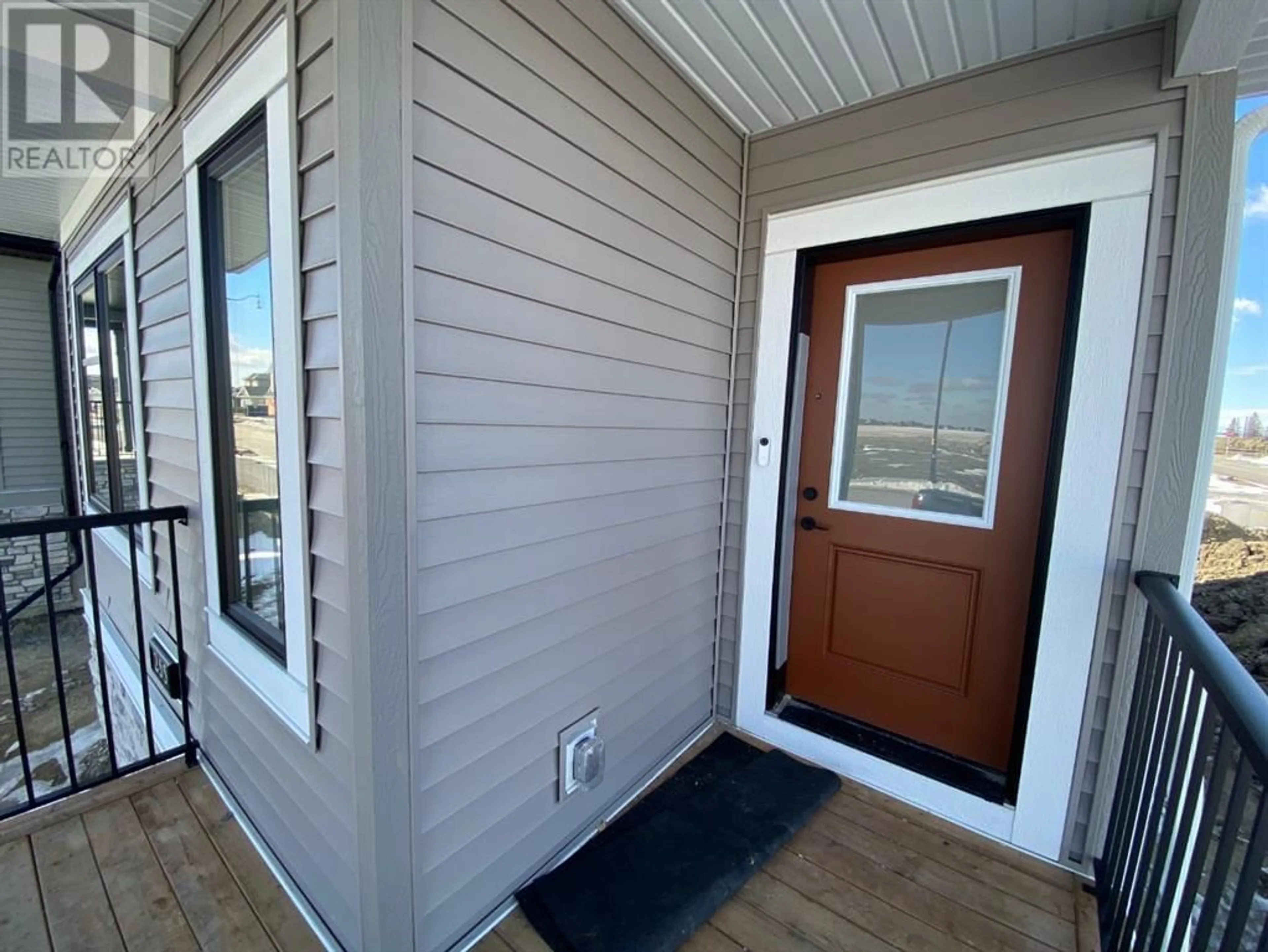 A pic from exterior of the house or condo for 255 Vista Road, Crossfield Alberta T0M0S0