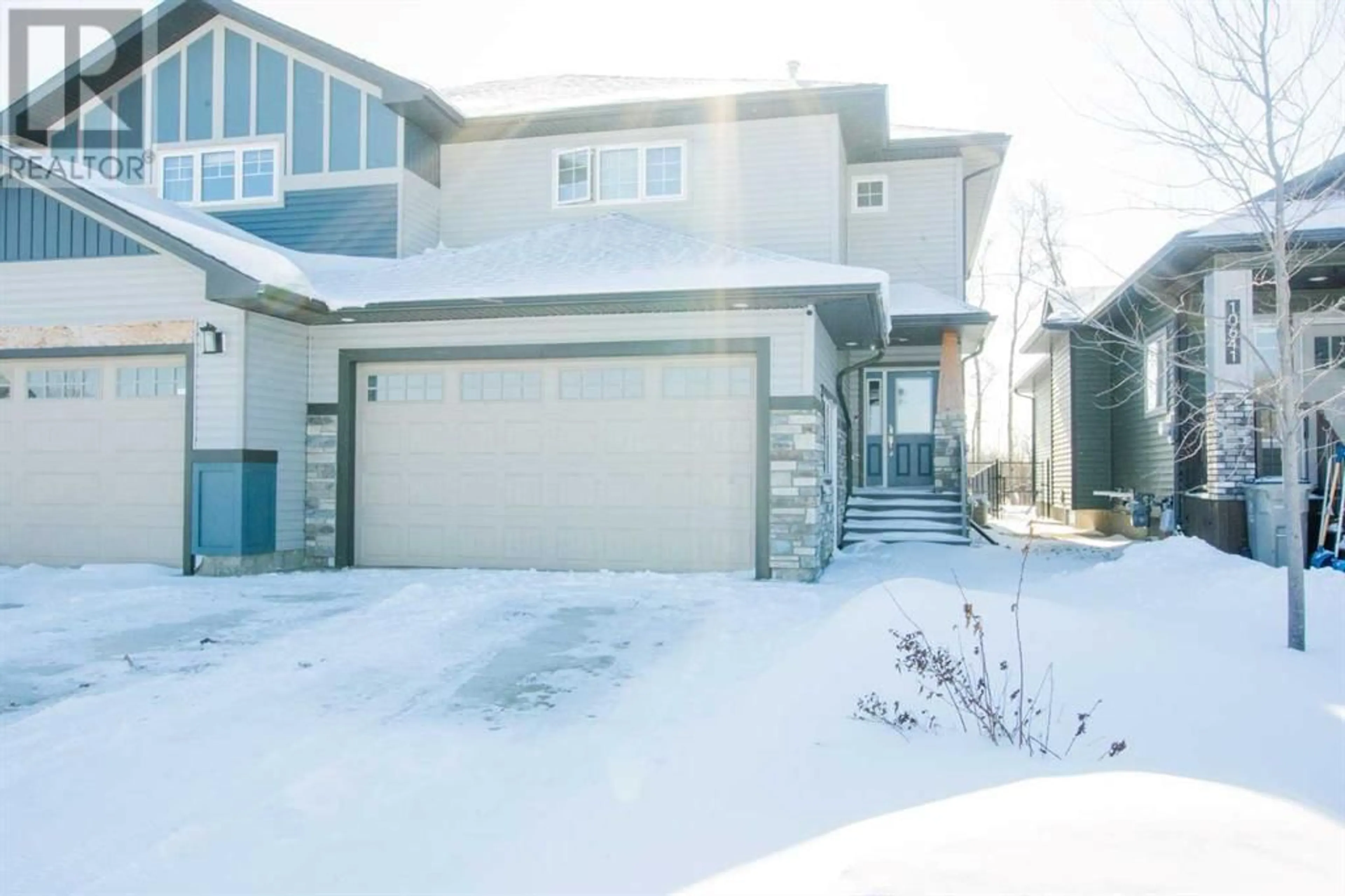 Frontside or backside of a home for 10637 66 Avenue, Grande Prairie Alberta T8W0L5