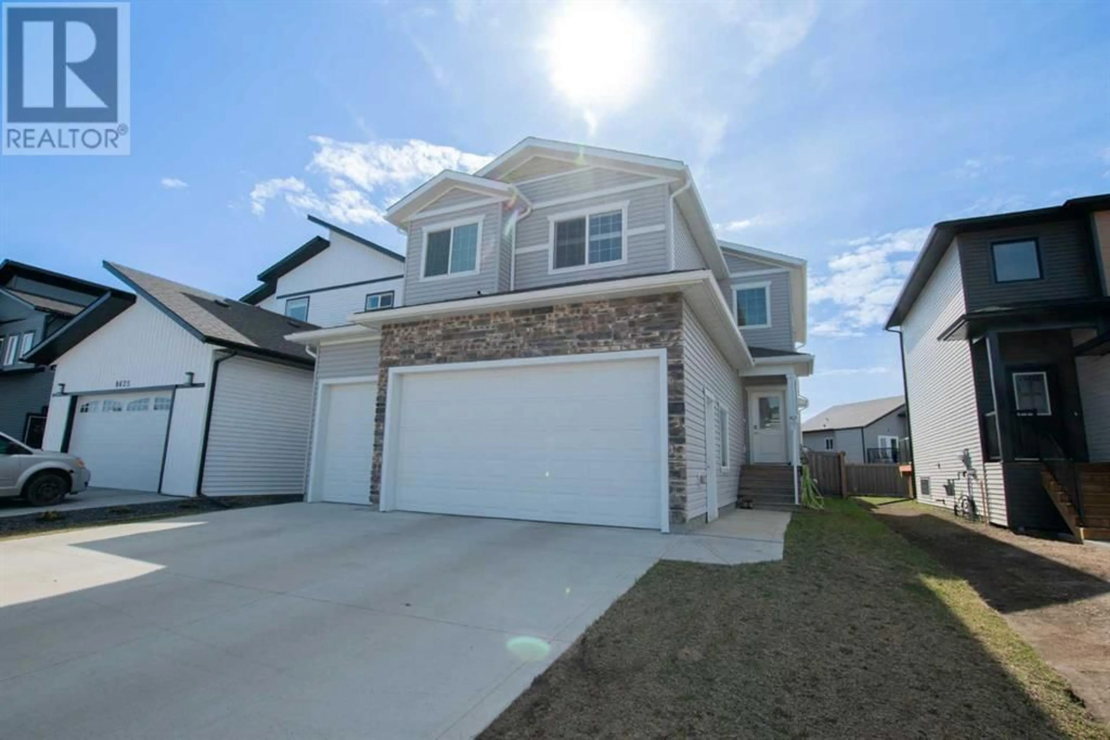 Frontside or backside of a home for 8629 72 Avenue, Grande Prairie Alberta T8X0N9