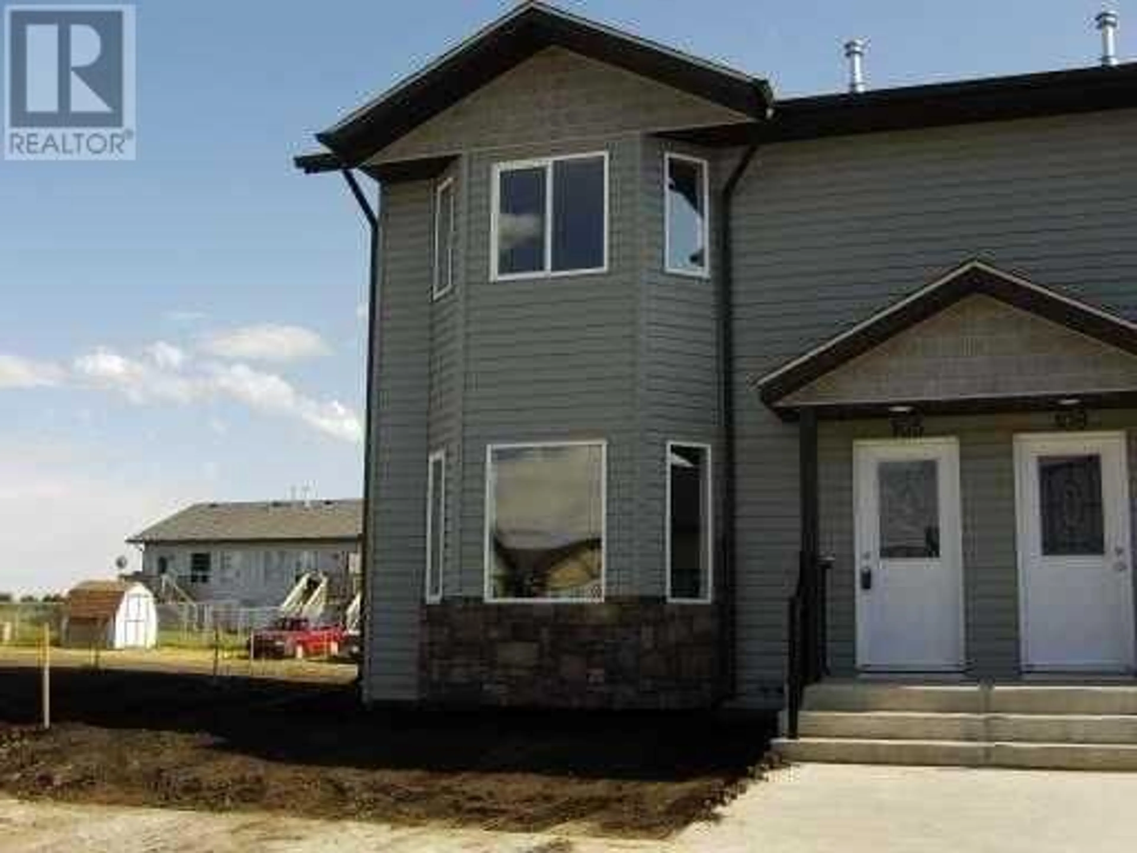 Frontside or backside of a home for 105 Winston Place, Blackfalds Alberta T0M0J0