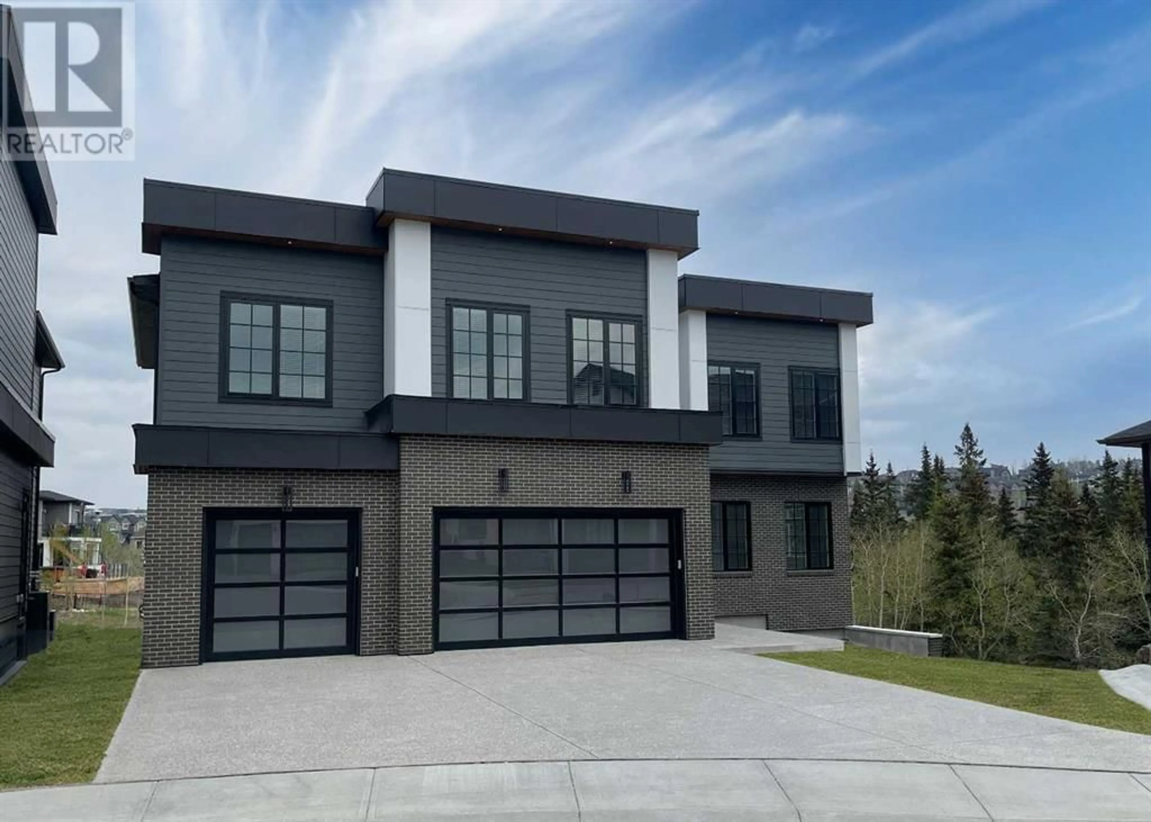 Home with brick exterior material for 25 Timberline Court SW, Calgary Alberta T3H6C8