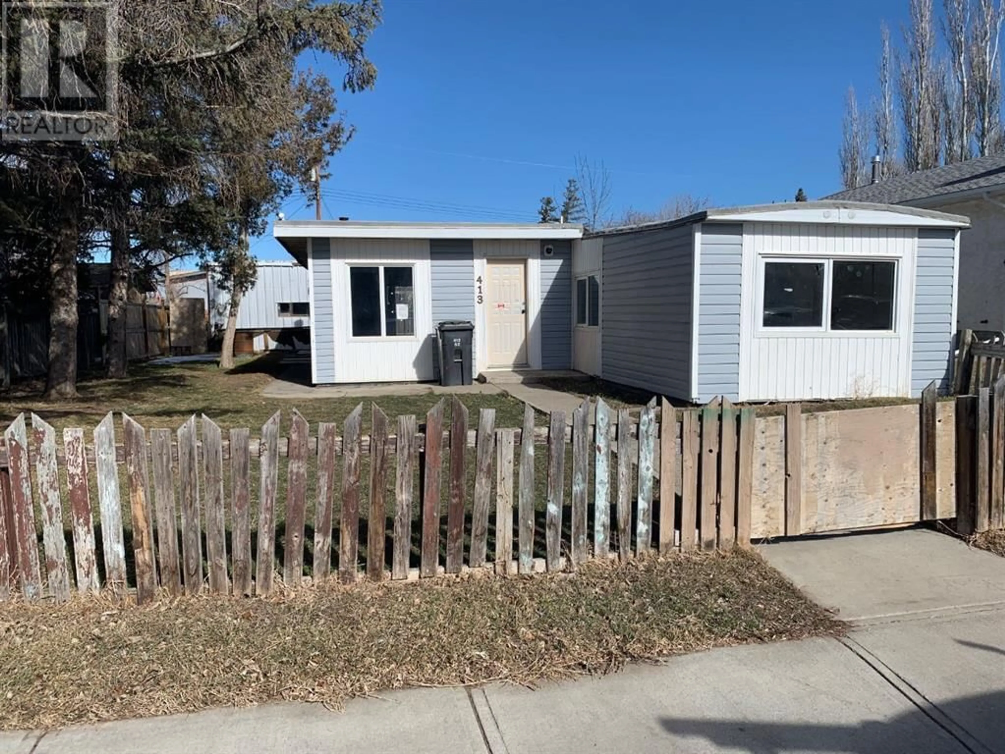 Frontside or backside of a home for 413 52 Avenue, Coalhurst Alberta T0L0V0