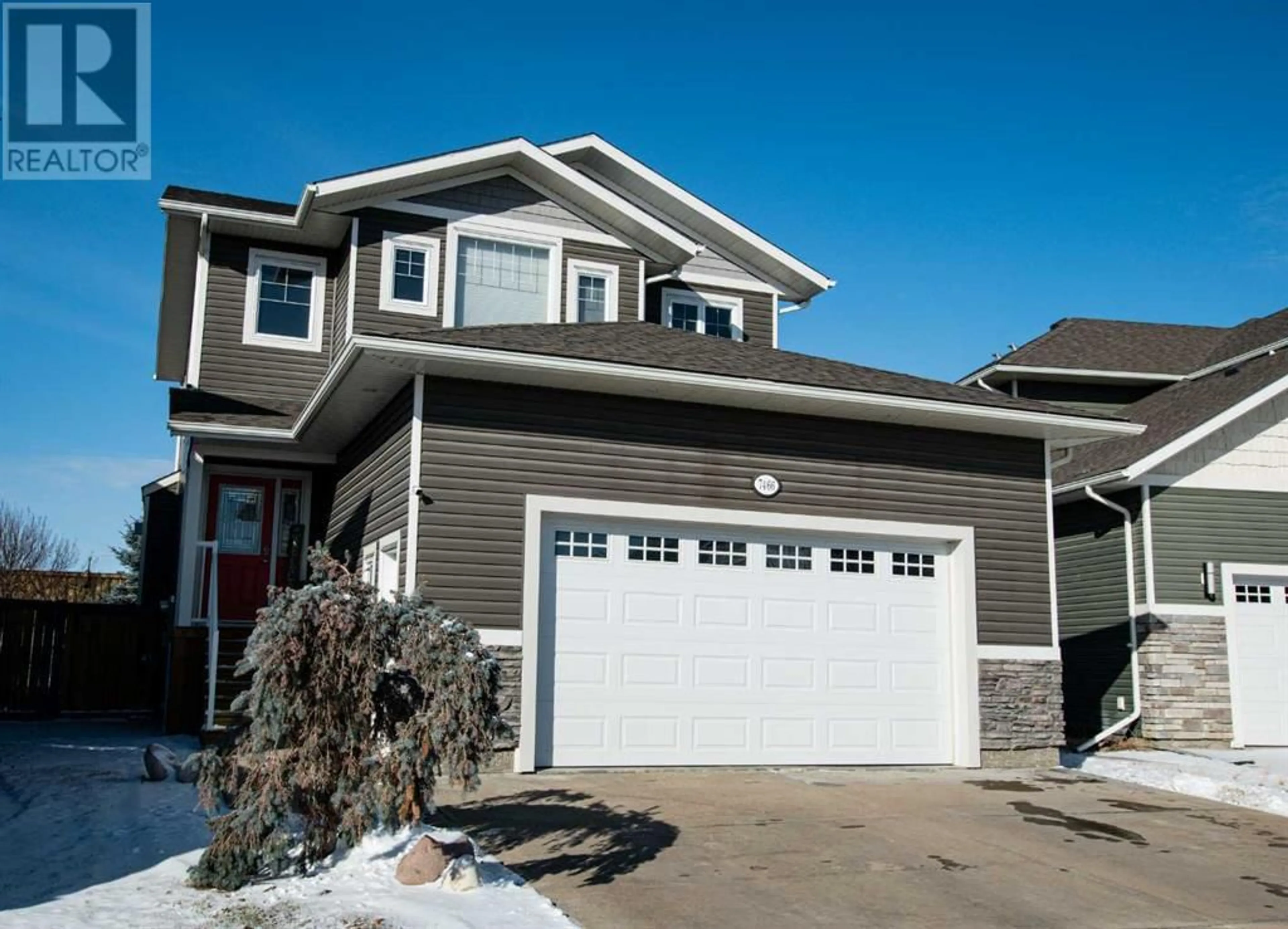 Frontside or backside of a home for 7466 91 Street, Grande Prairie Alberta T8X0H9