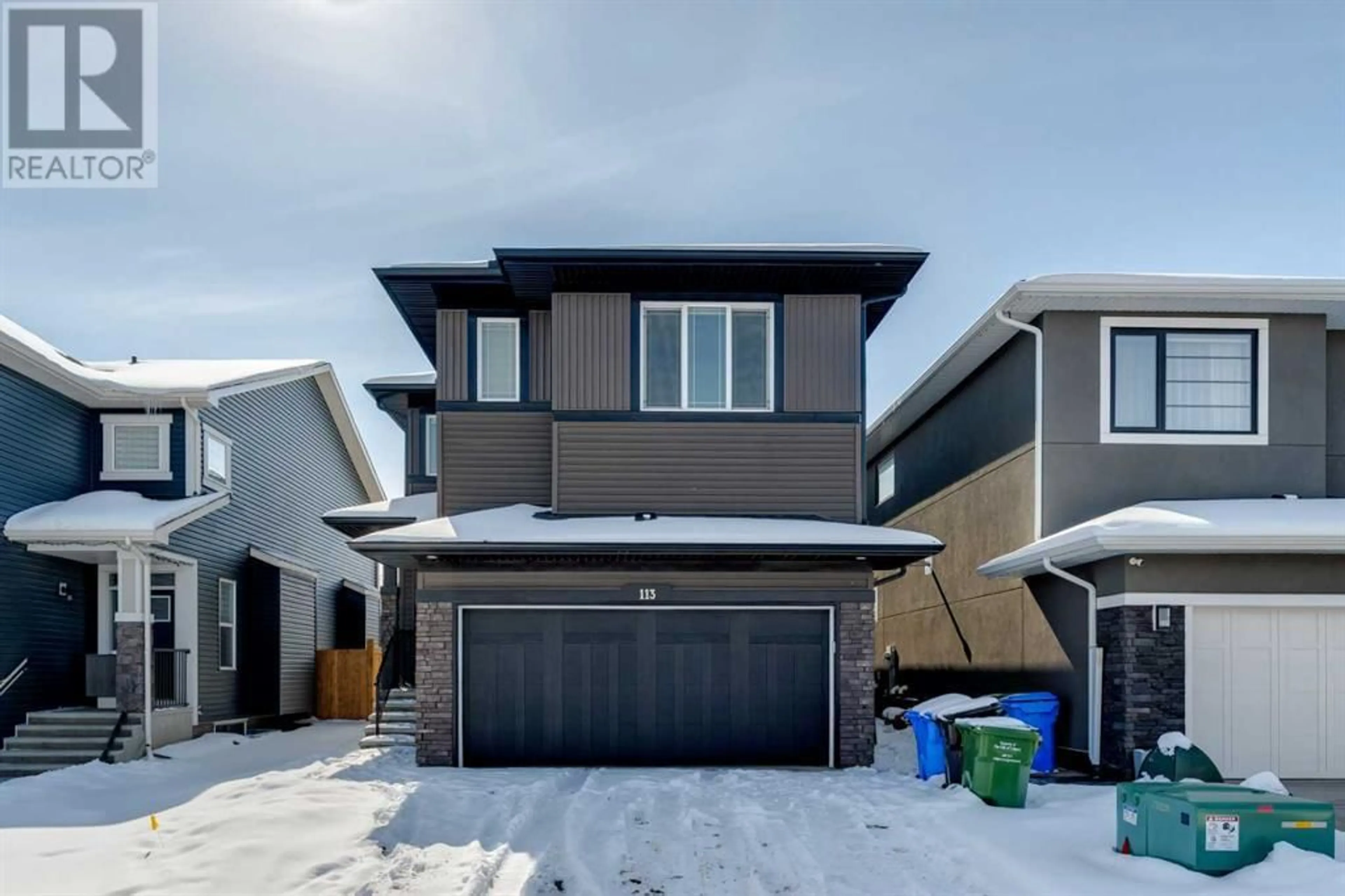 Frontside or backside of a home for 113 Creekside Way SW, Calgary Alberta T2X4A9