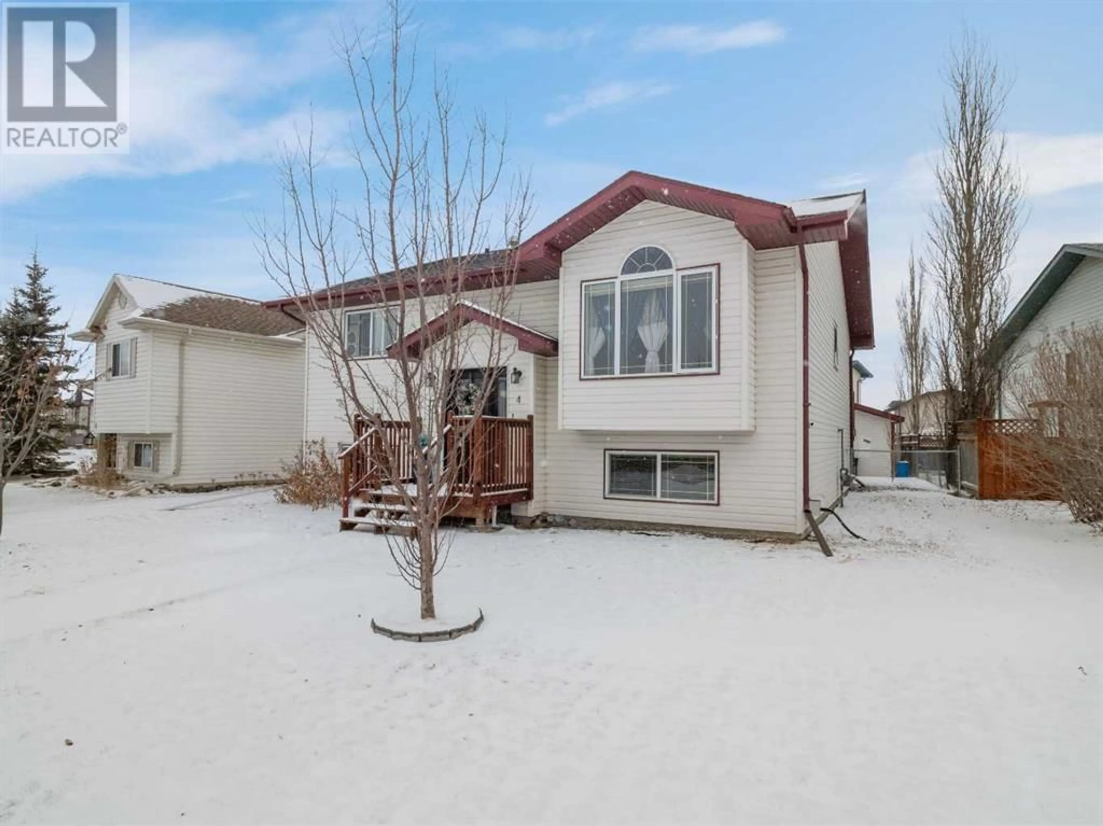 Frontside or backside of a home for 4 Hillman Way, Sylvan Lake Alberta T4S1W9