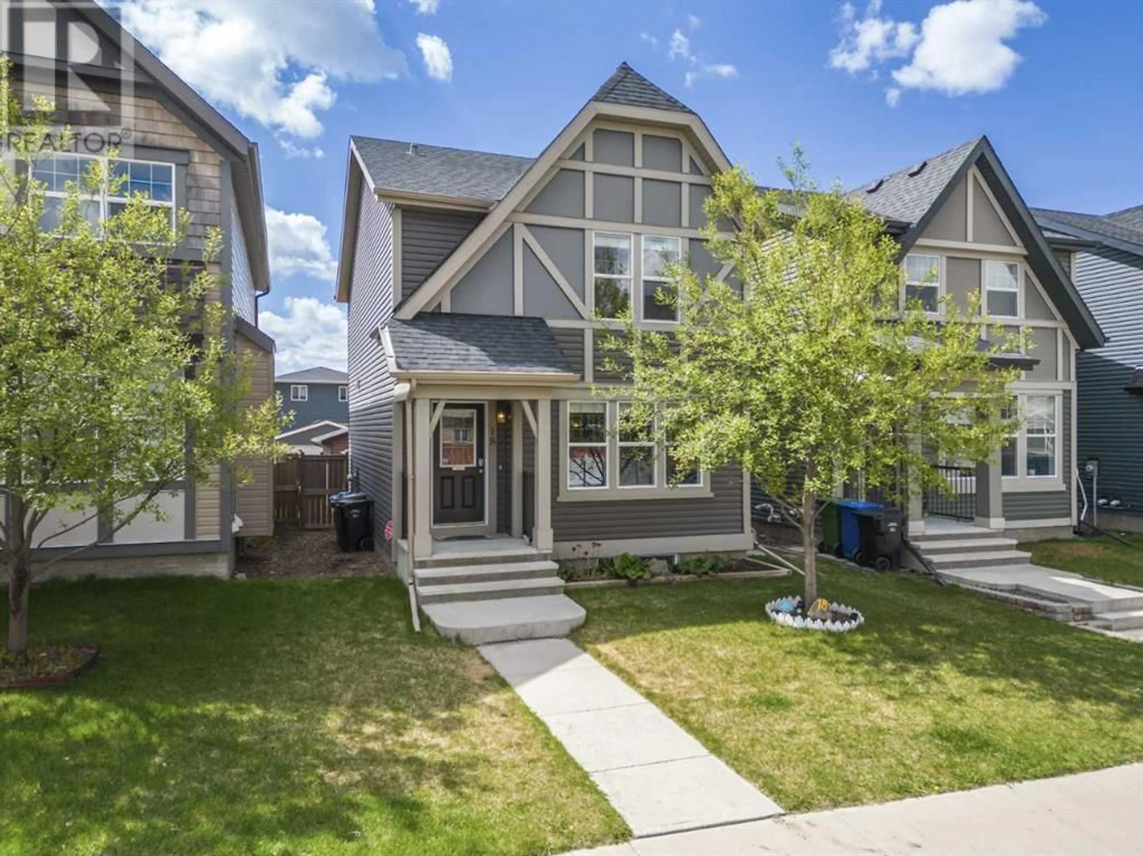 Frontside or backside of a home for 18 Evansborough Crescent NW, Calgary Alberta T3P0M4