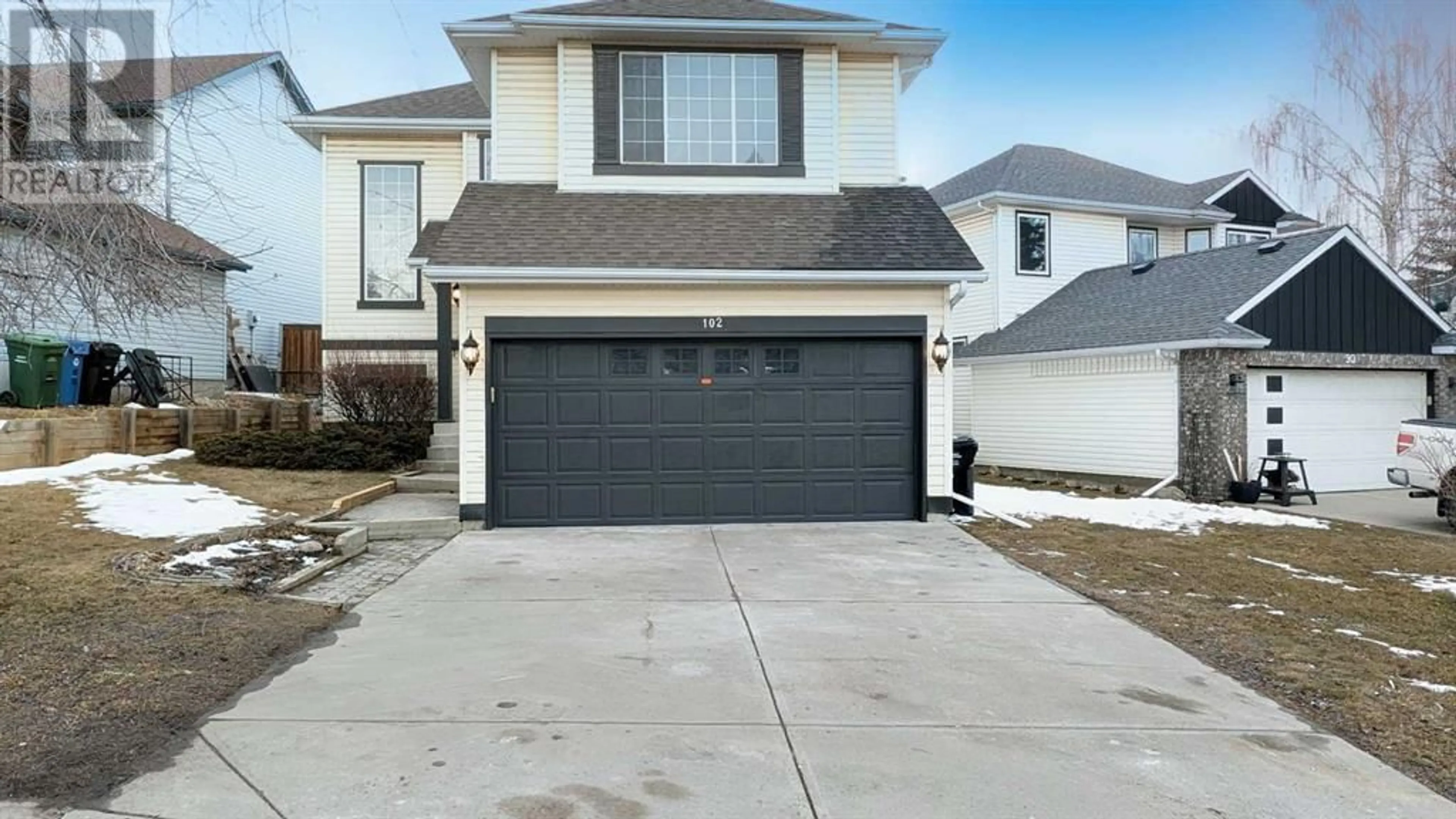 Frontside or backside of a home for 102 Somercrest Circle SW, Calgary Alberta T2Y3H2