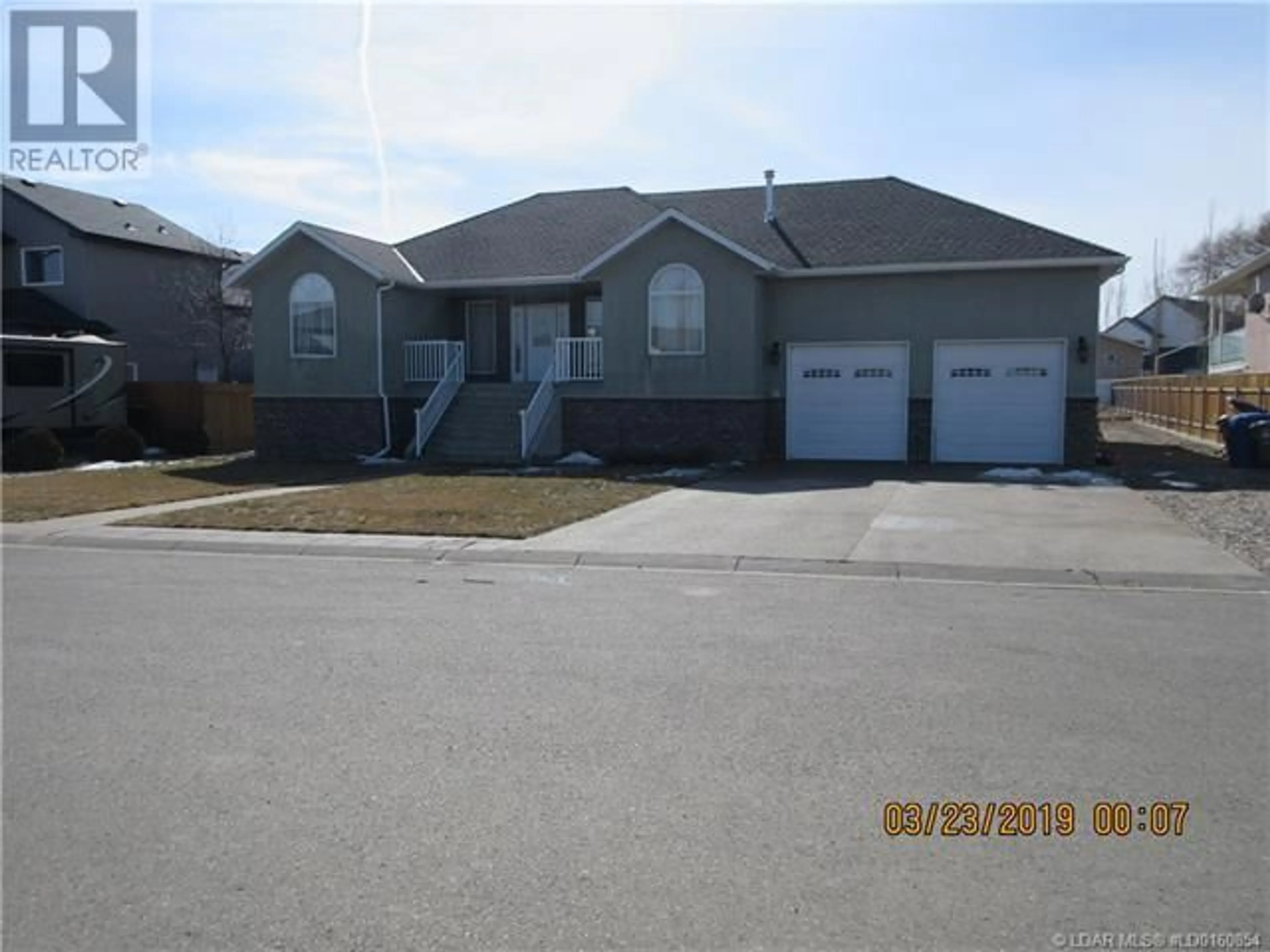 Frontside or backside of a home for 4628 62 Avenue, Taber Alberta T1G2J5