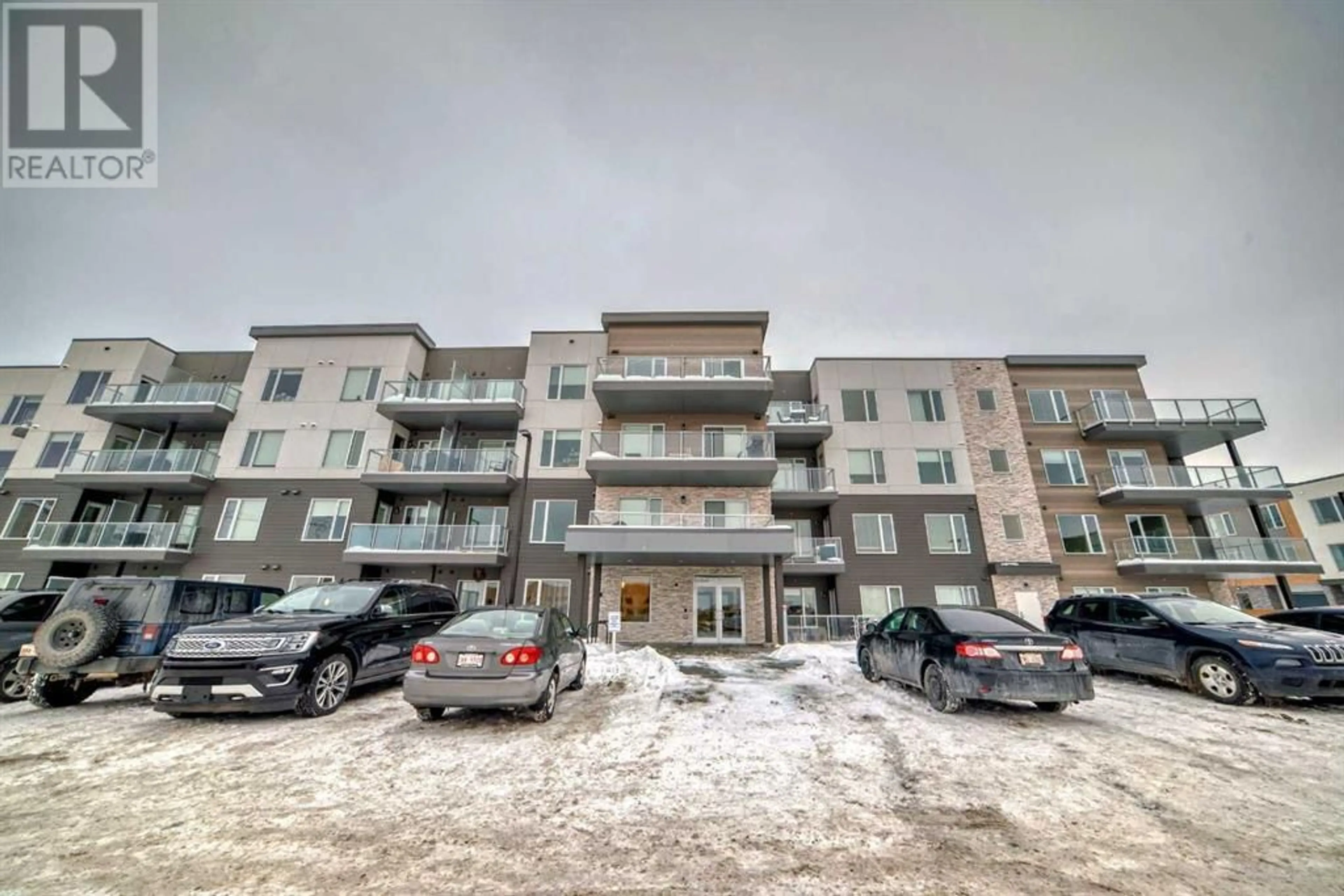 A pic from exterior of the house or condo for 207 200 Shawnee Square SW, Calgary Alberta T2Y0T7