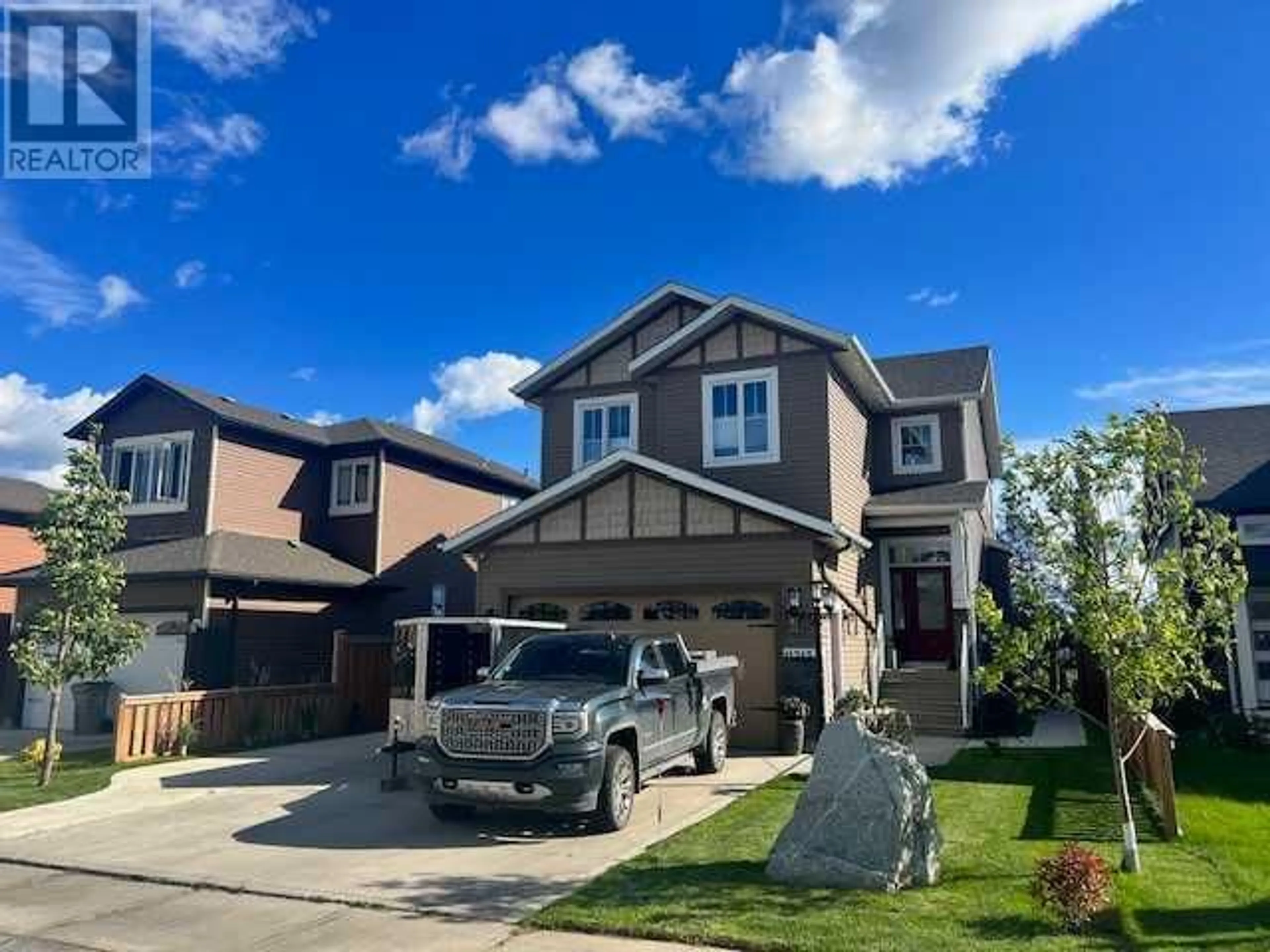 Frontside or backside of a home for 11313 106A Avenue, Grande Prairie Alberta T8V5X5