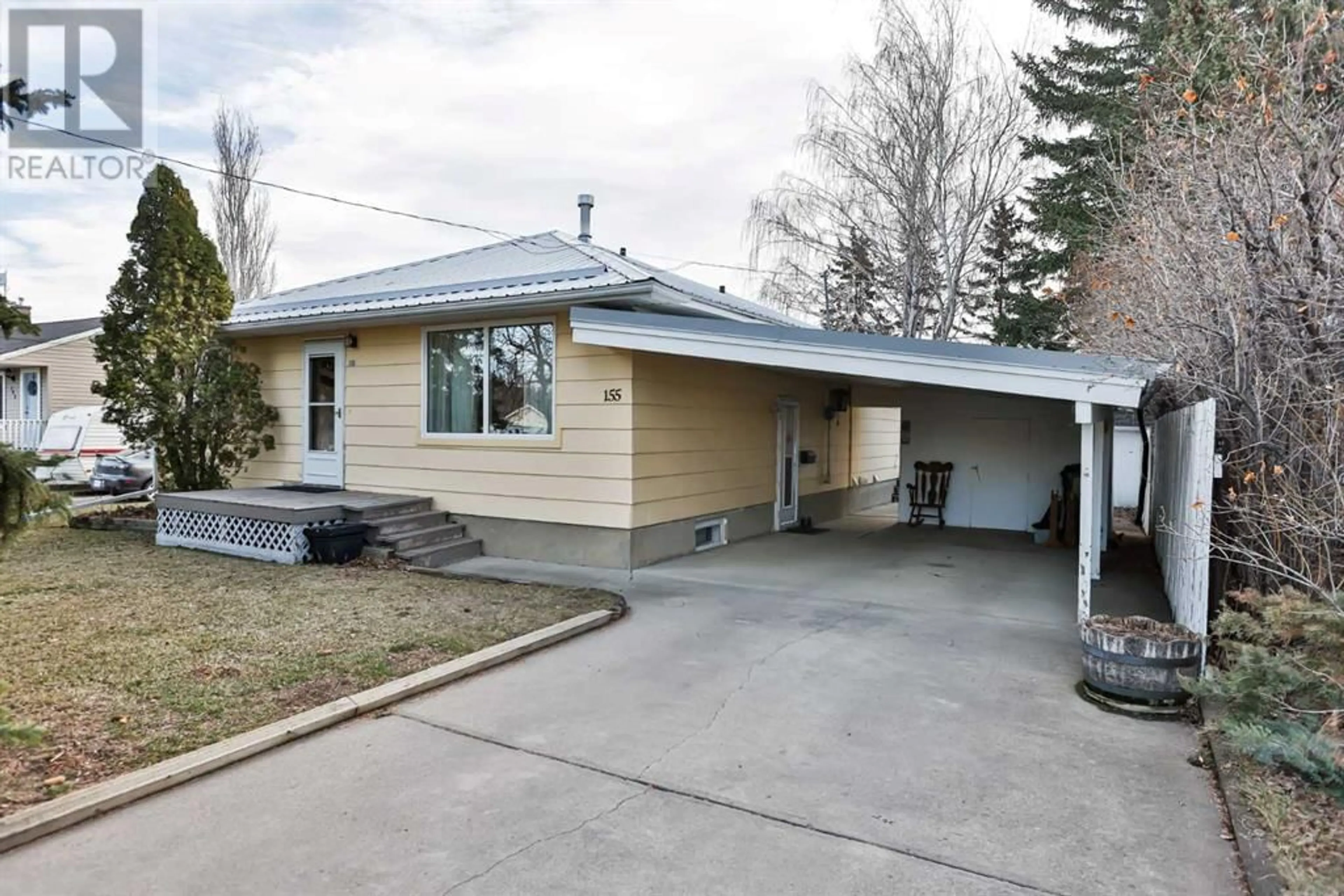 Frontside or backside of a home for 155 S 100 W, Raymond Alberta T0K2S0