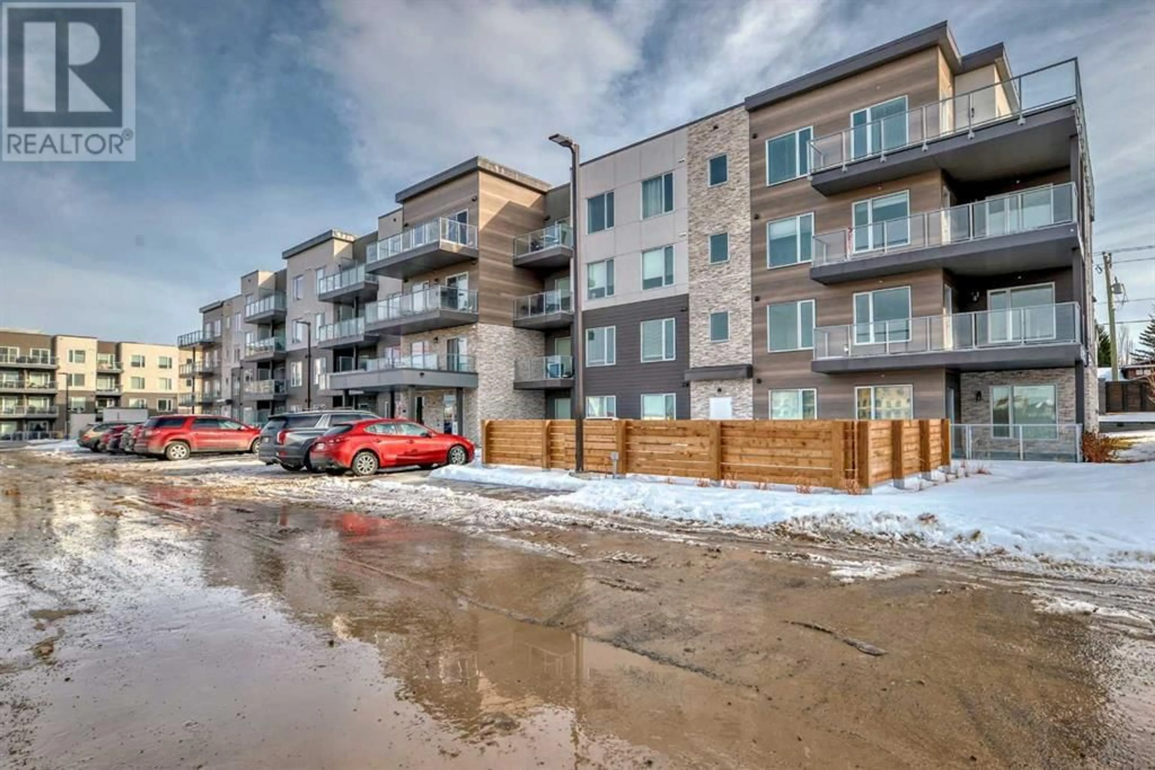 A pic from exterior of the house or condo for 405 200 Shawnee Square SW, Calgary Alberta T2Y0T7