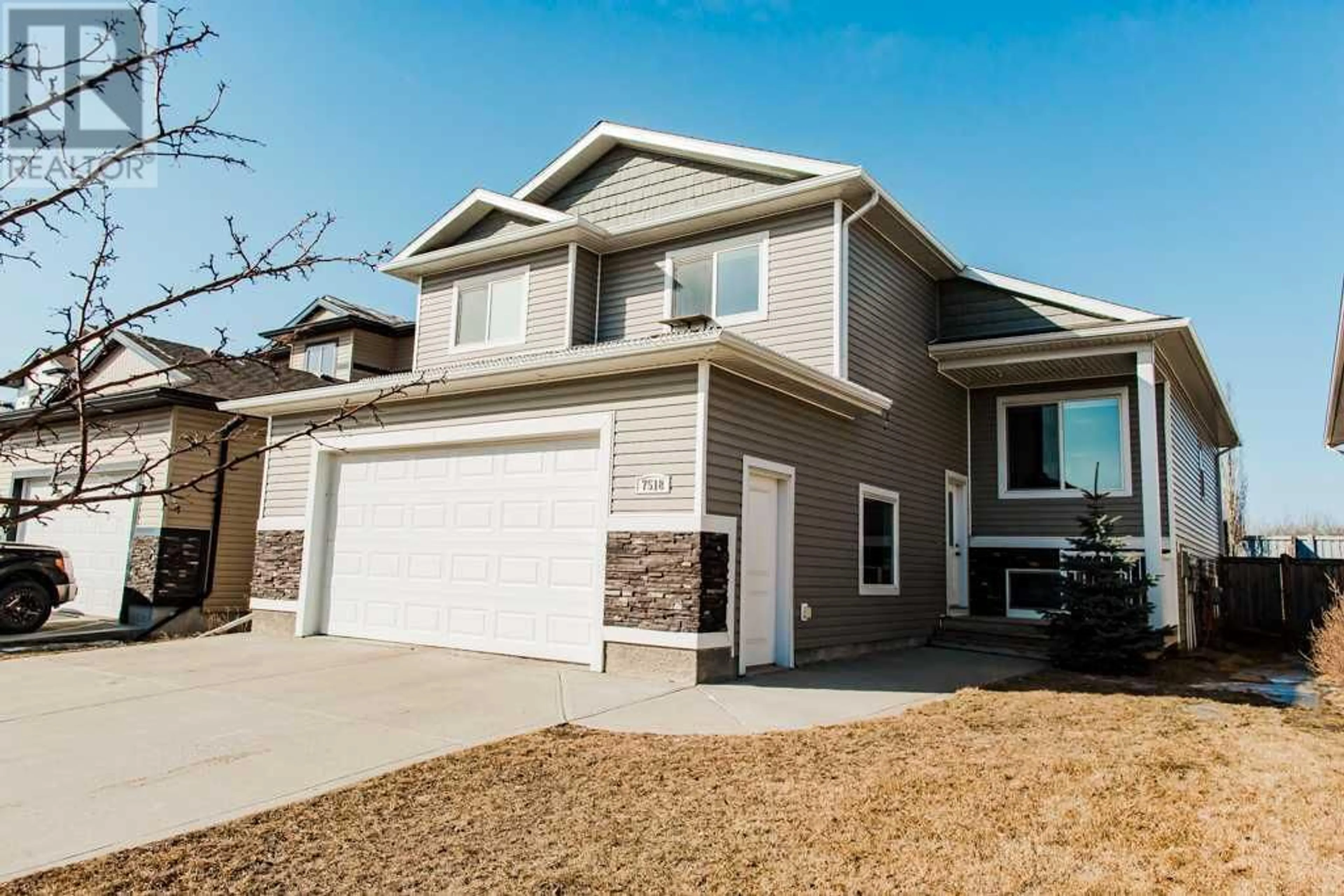 Frontside or backside of a home for 7518 115B Street, Grande Prairie Alberta T8W0J2