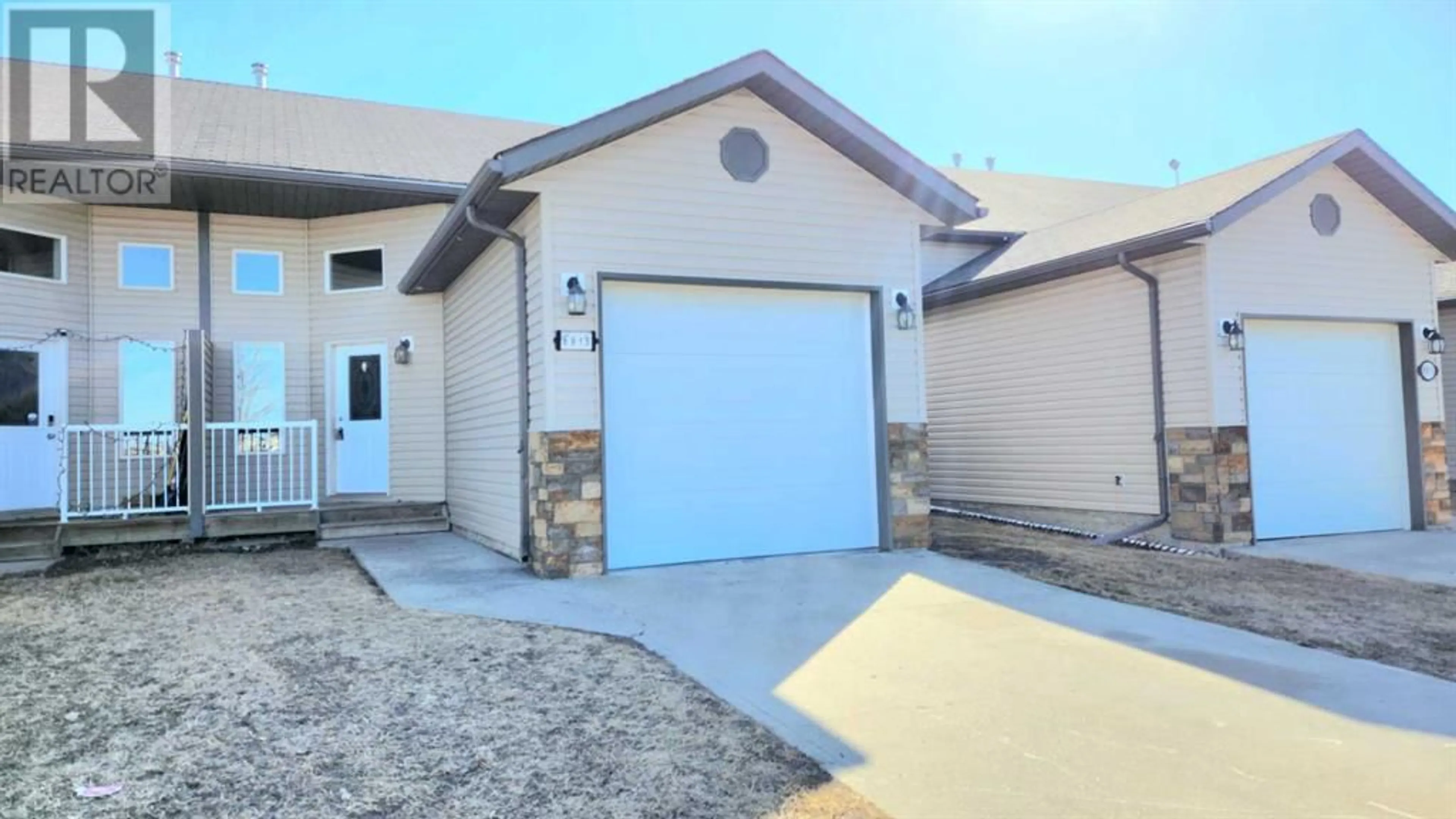 Frontside or backside of a home for 6915 112 Street, Grande Prairie Alberta T8W0C9