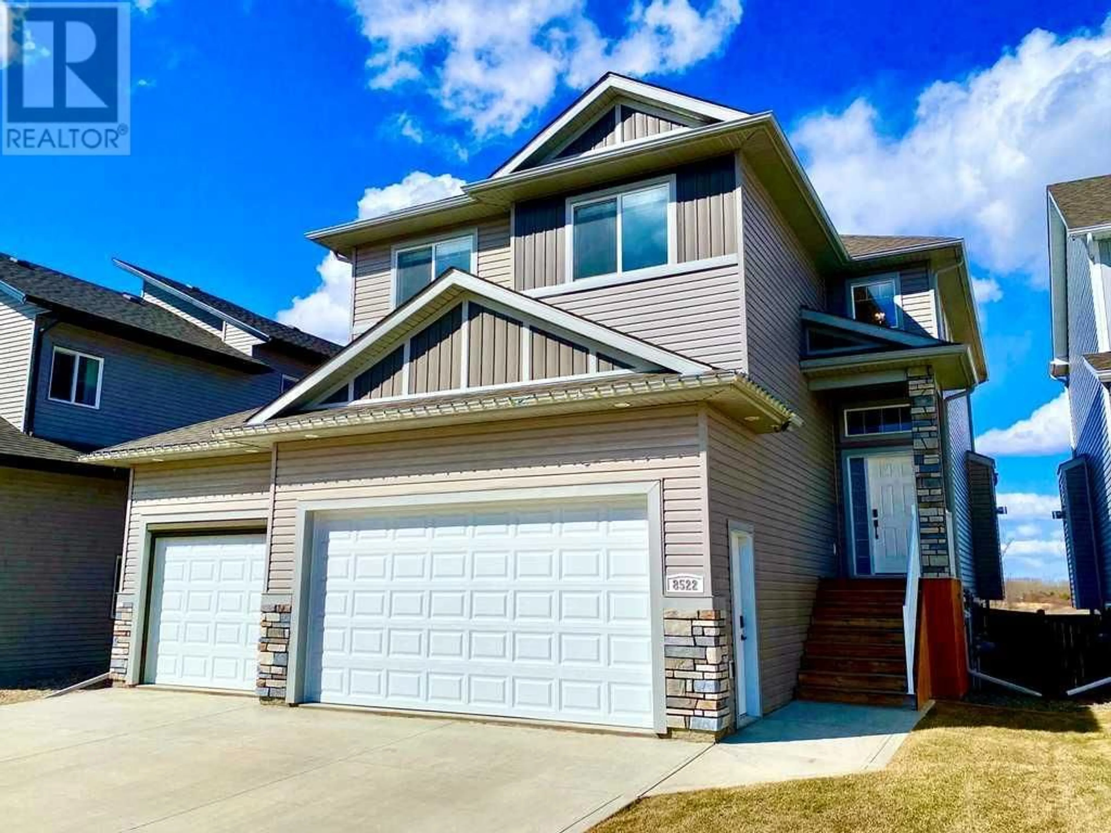 Frontside or backside of a home for 8522 71A Avenue, Grande Prairie Alberta T8X0N8