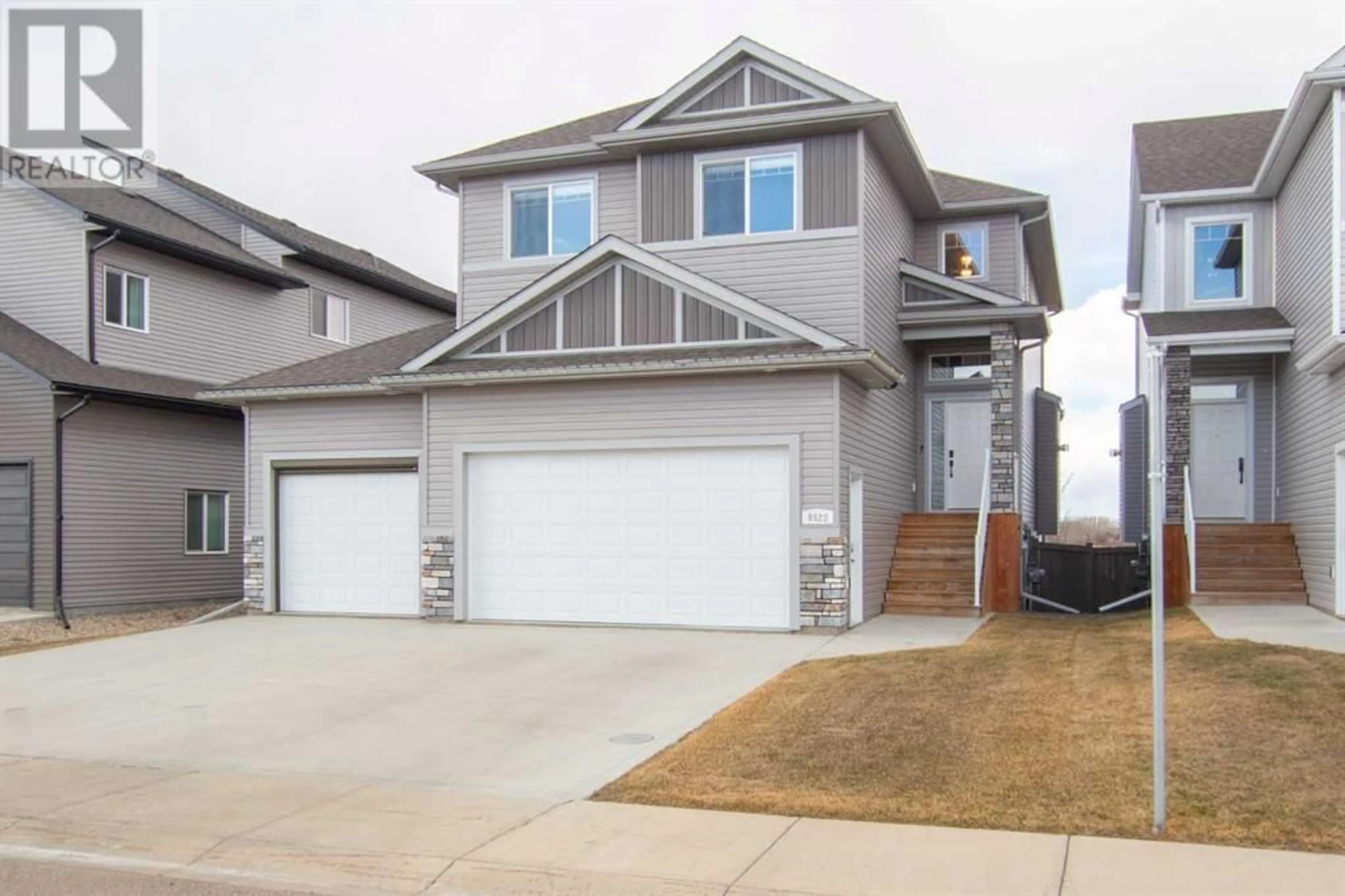 Frontside or backside of a home for 8522 71A Avenue, Grande Prairie Alberta T8X0N8
