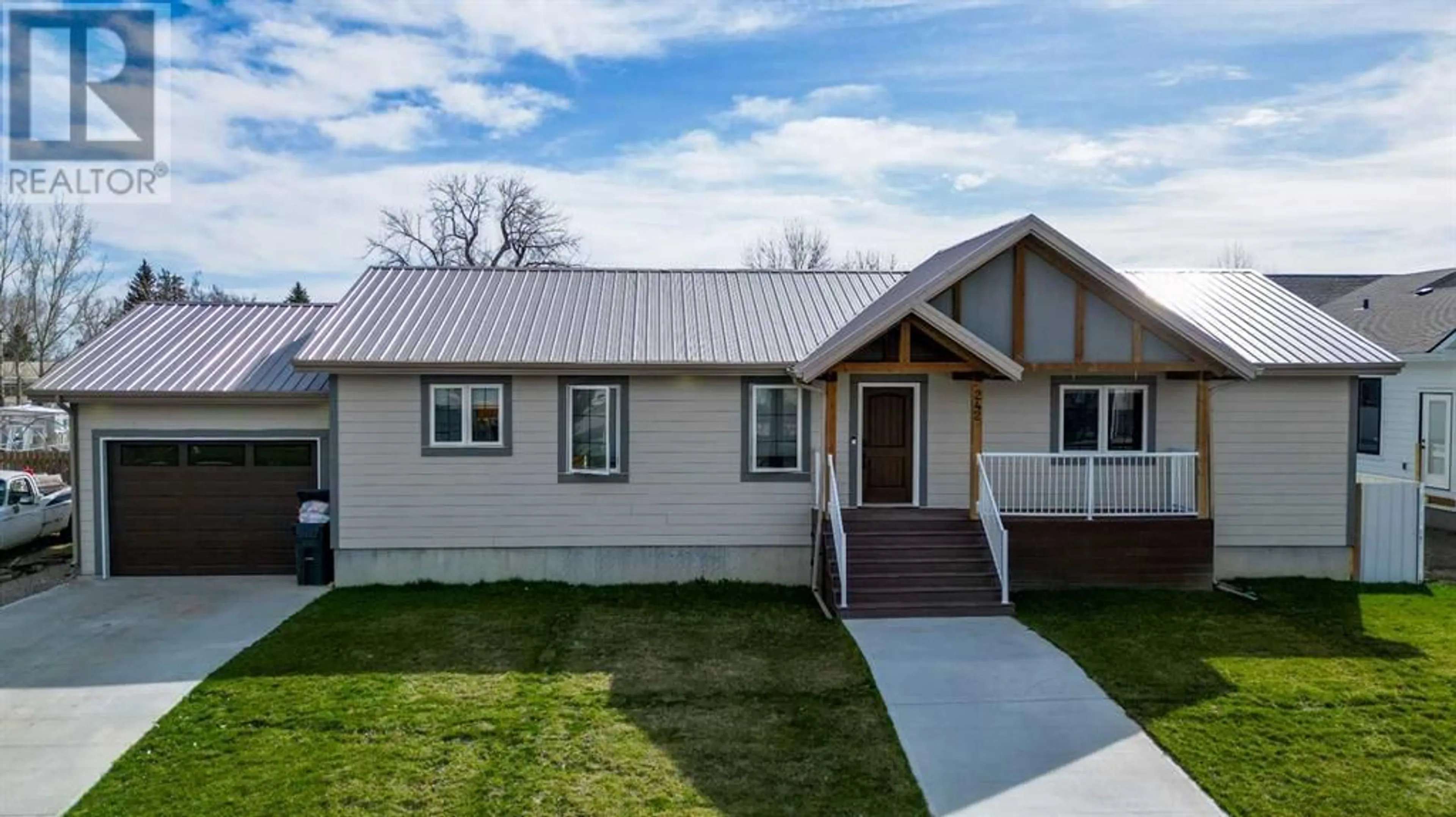 Home with vinyl exterior material for 242 4A Street, Stirling Alberta T0K2E0