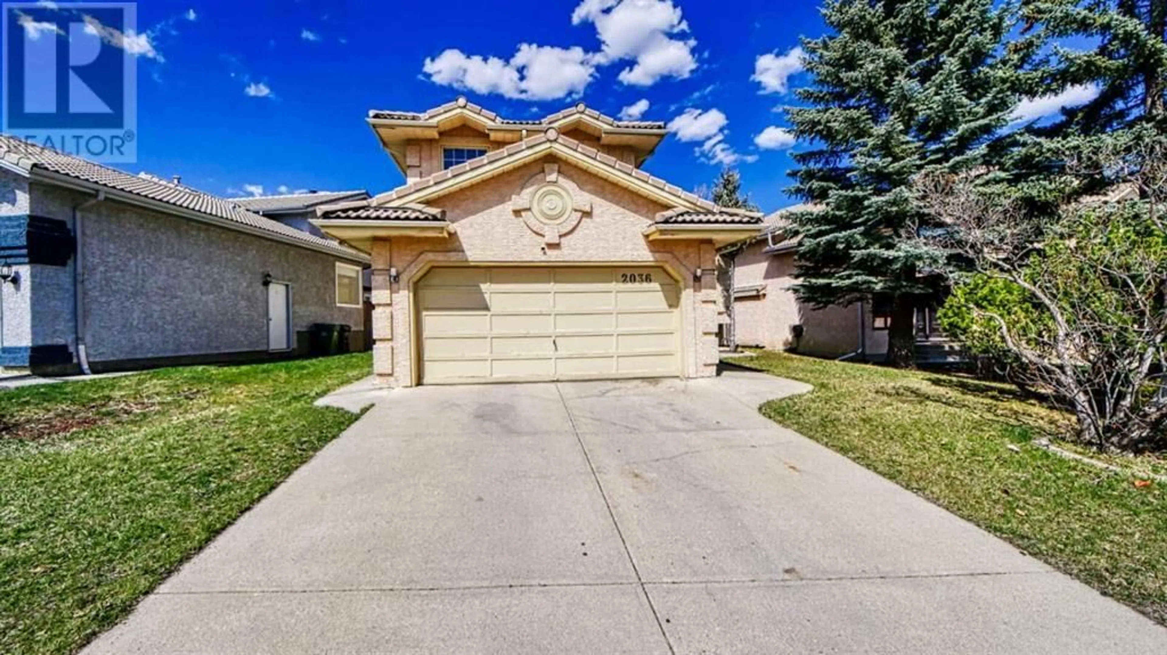 Frontside or backside of a home for 2036 Sirocco Drive SW, Calgary Alberta T3H2M9