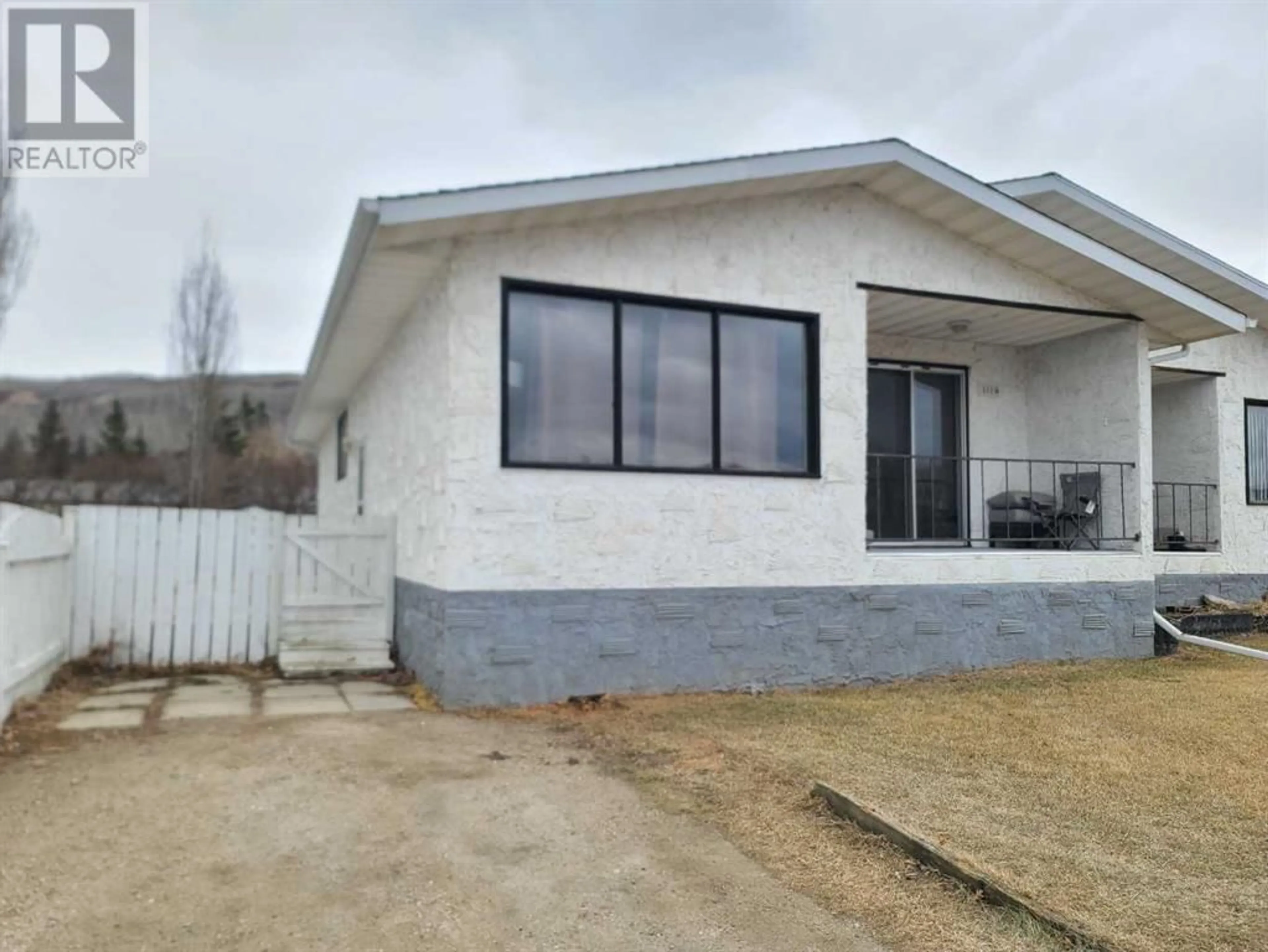 Frontside or backside of a home for 8005A 99 Street, Peace River Alberta T8S1A8
