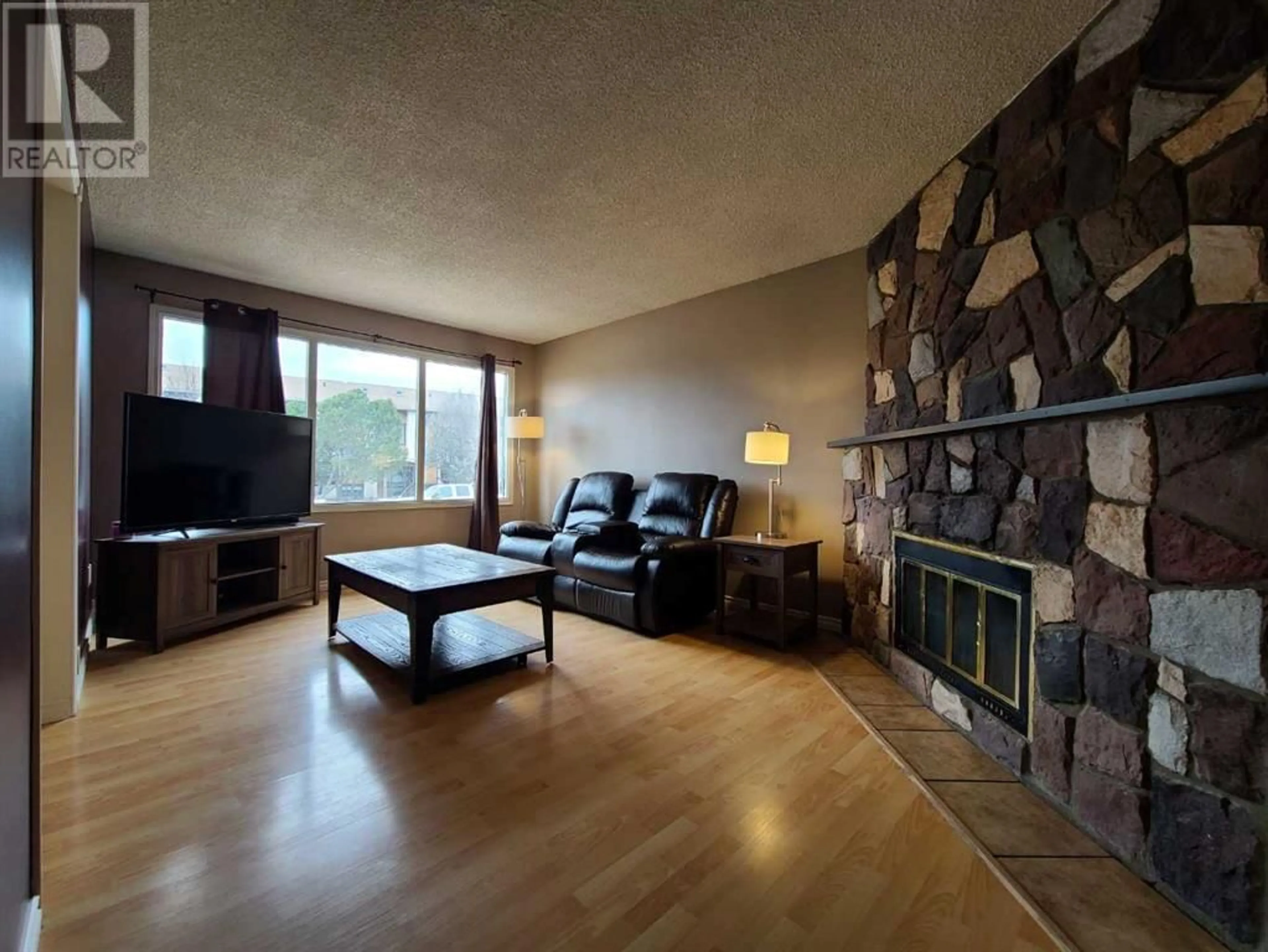 Living room for 8005A 99 Street, Peace River Alberta T8S1A8