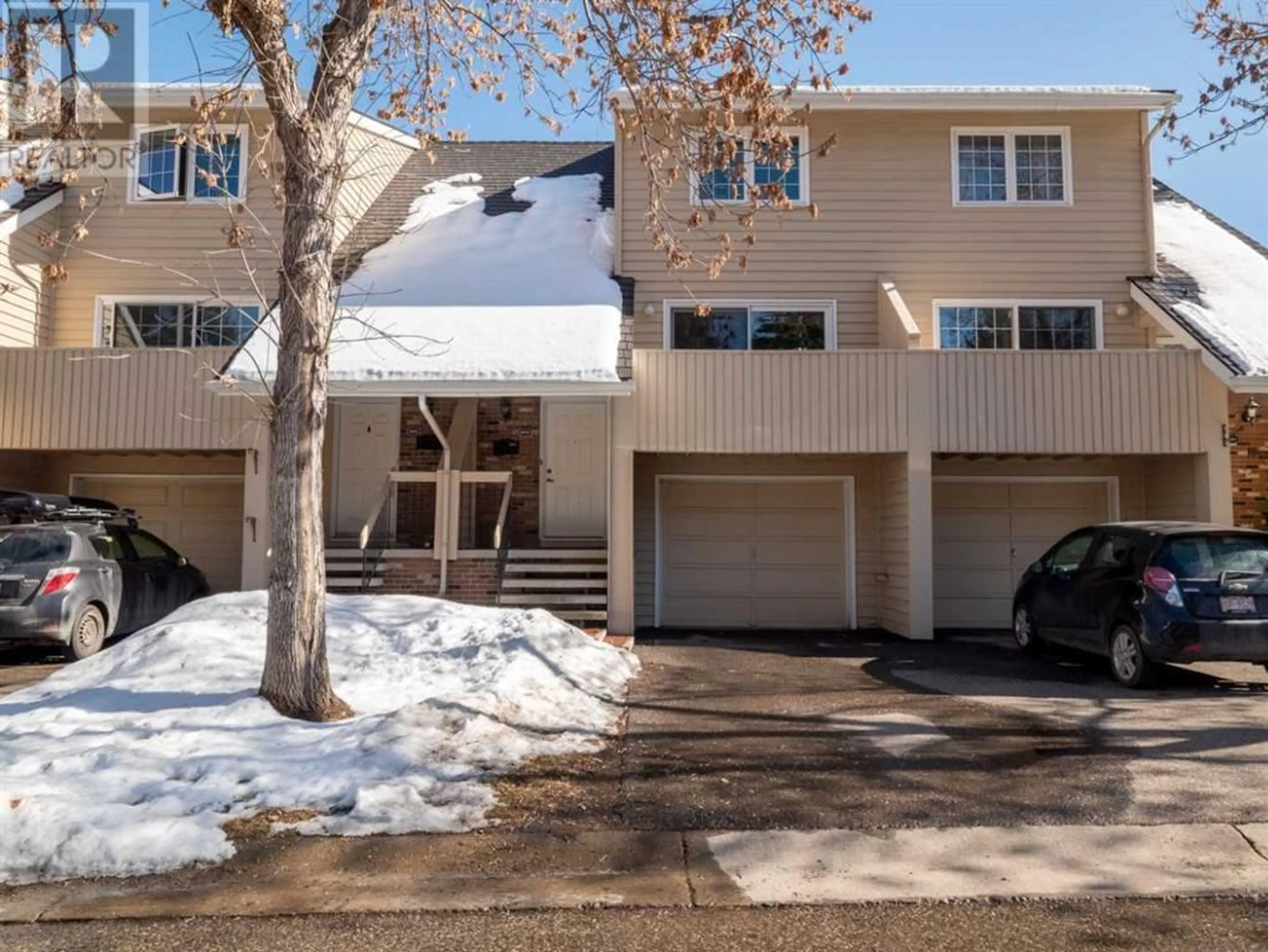 A pic from exterior of the house or condo for 393 Point Mckay Gardens NW, Calgary Alberta T3B5C1