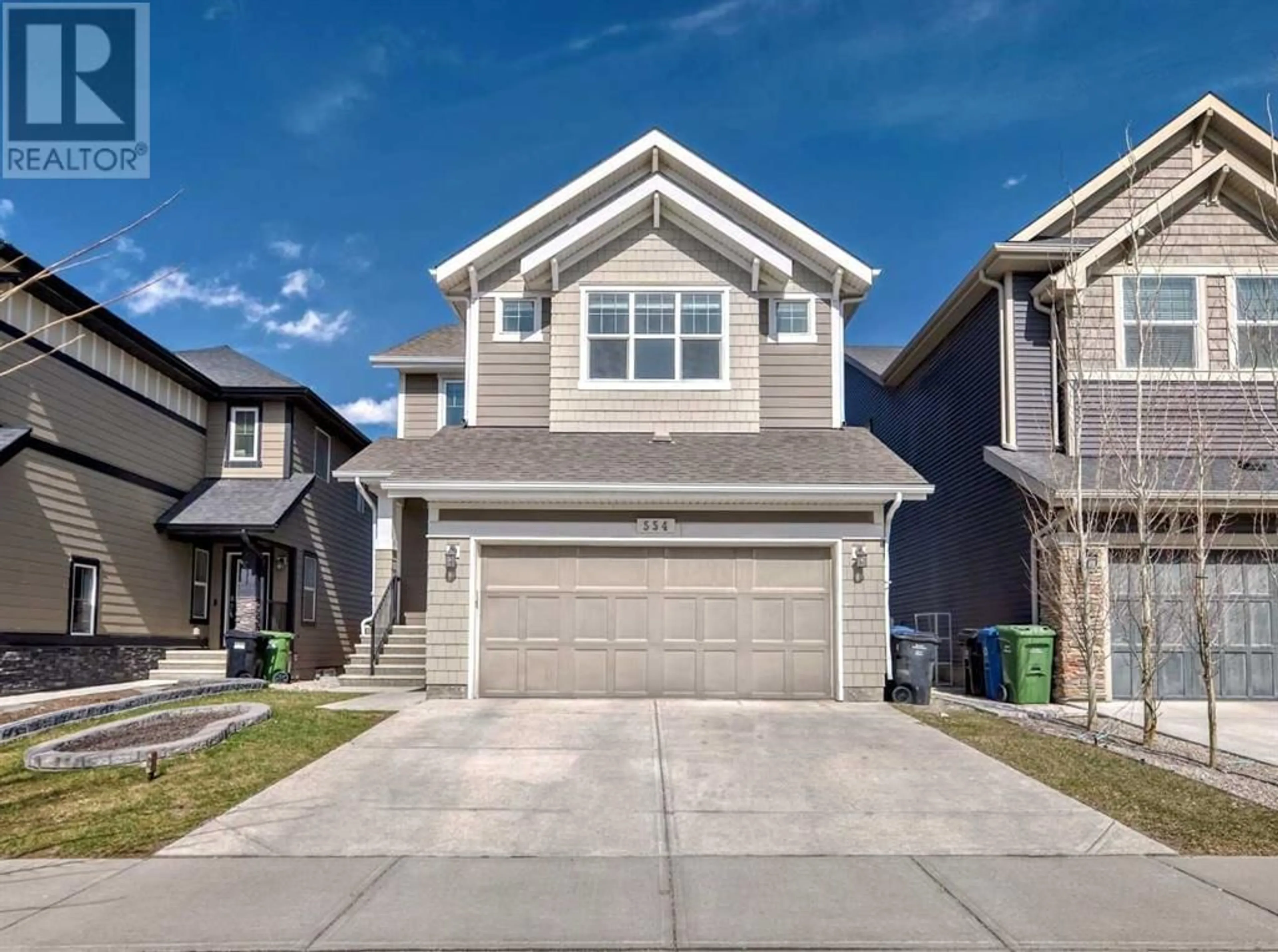 Frontside or backside of a home for 554 Sherwood Boulevard NW, Calgary Alberta T3R1M9