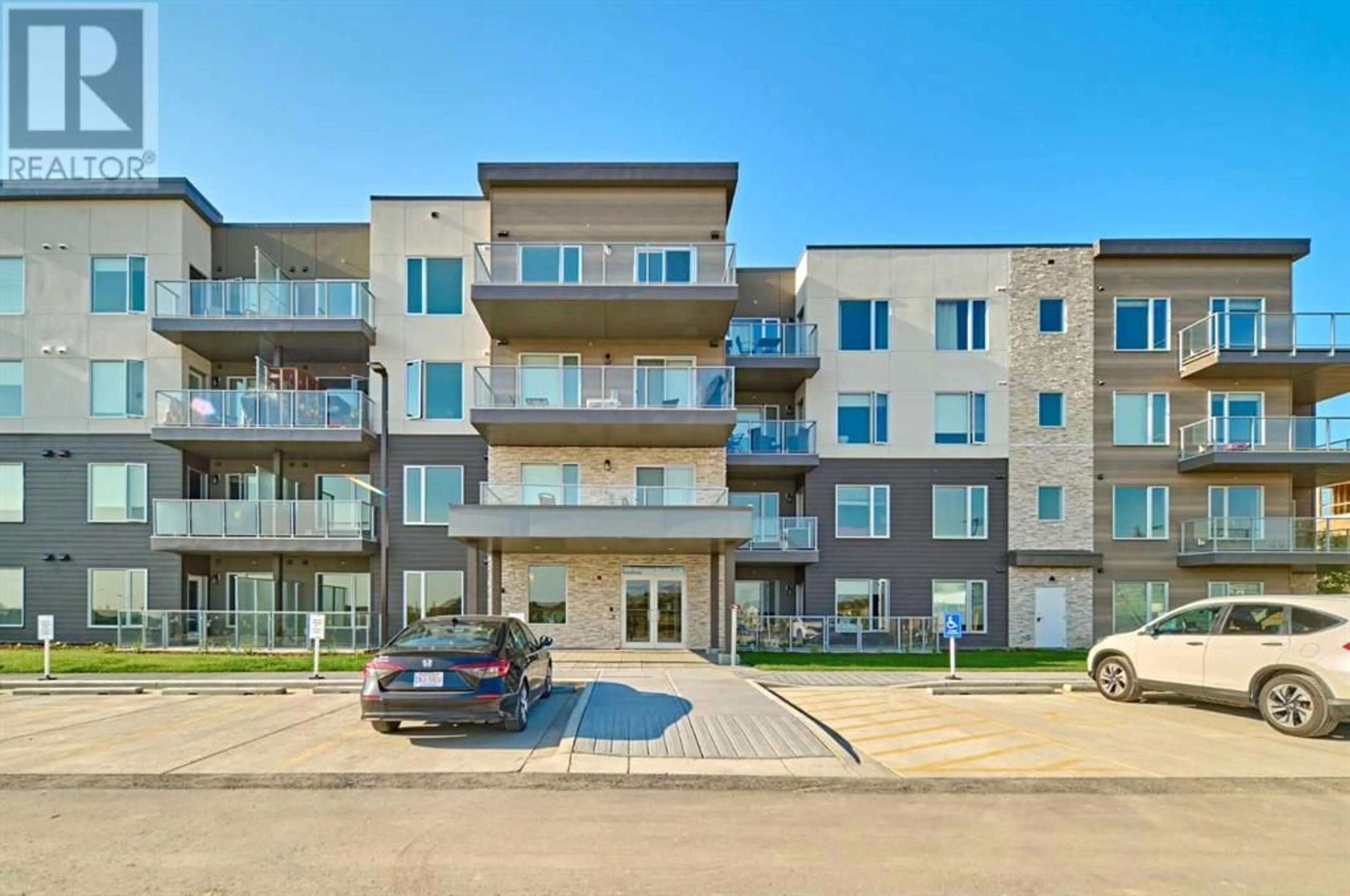 A pic from exterior of the house or condo for 210 200 Shawnee Square SW, Calgary Alberta T2Y0T7