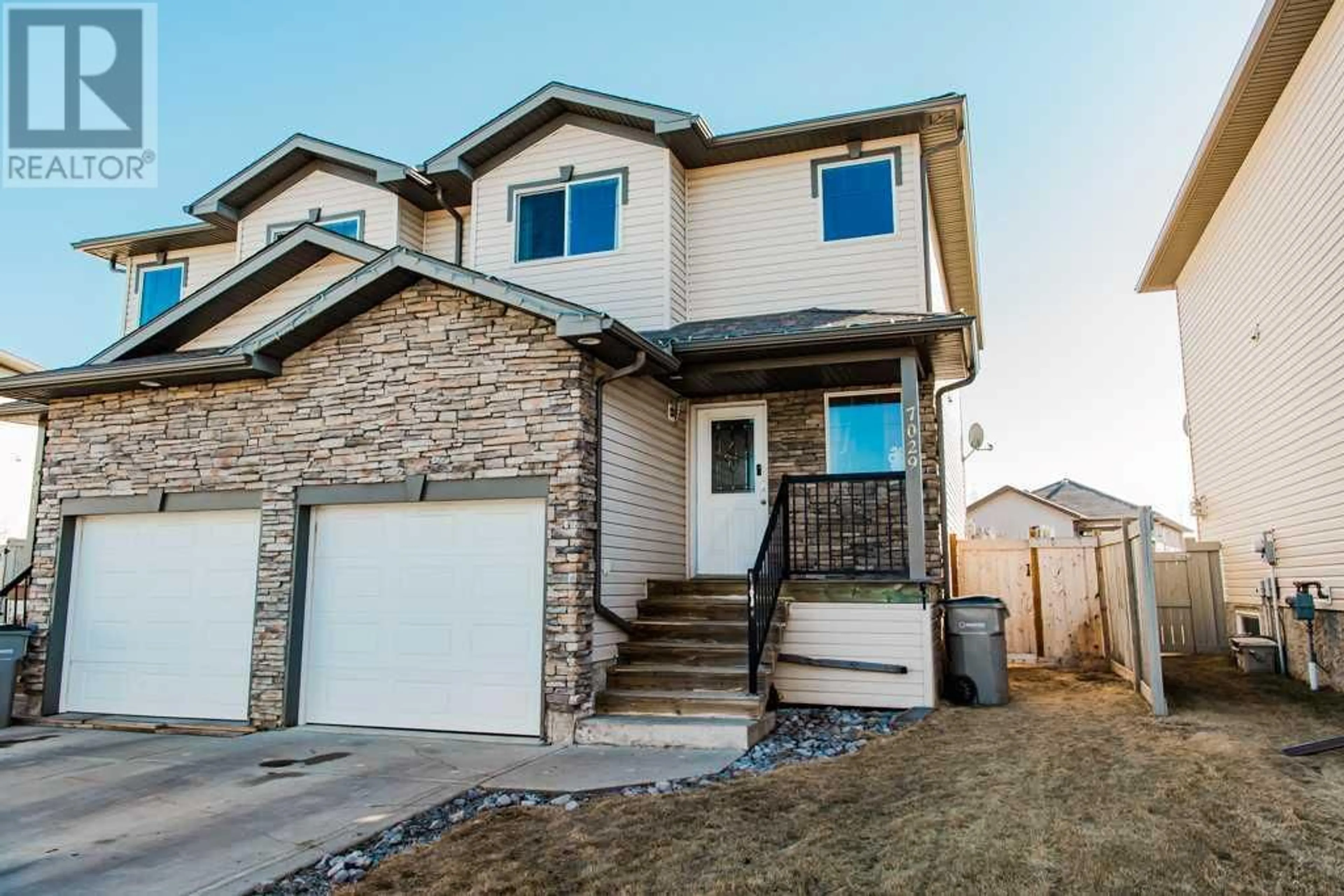 Frontside or backside of a home for 7029 112 Street, Grande Prairie Alberta T8W0C8