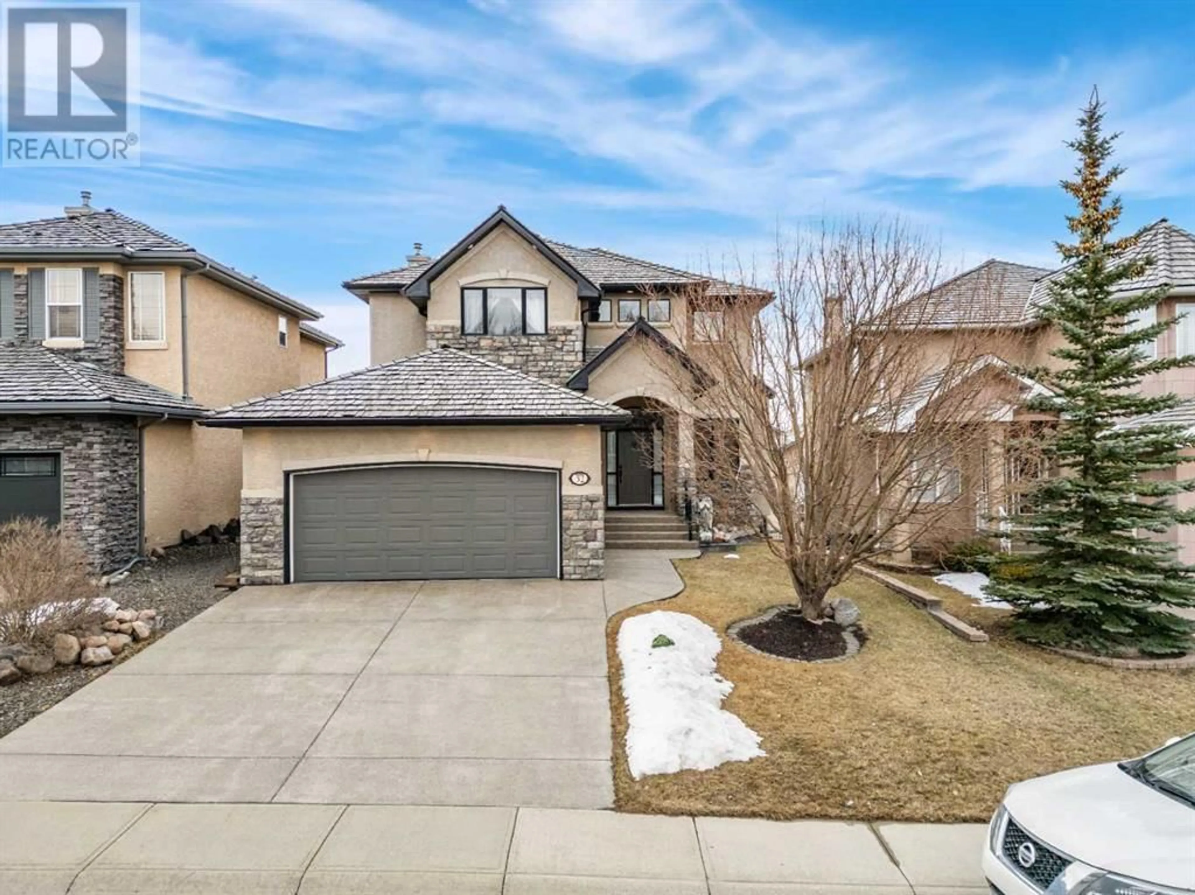 Frontside or backside of a home for 32 Royal Road NW, Calgary Alberta T3G5G9