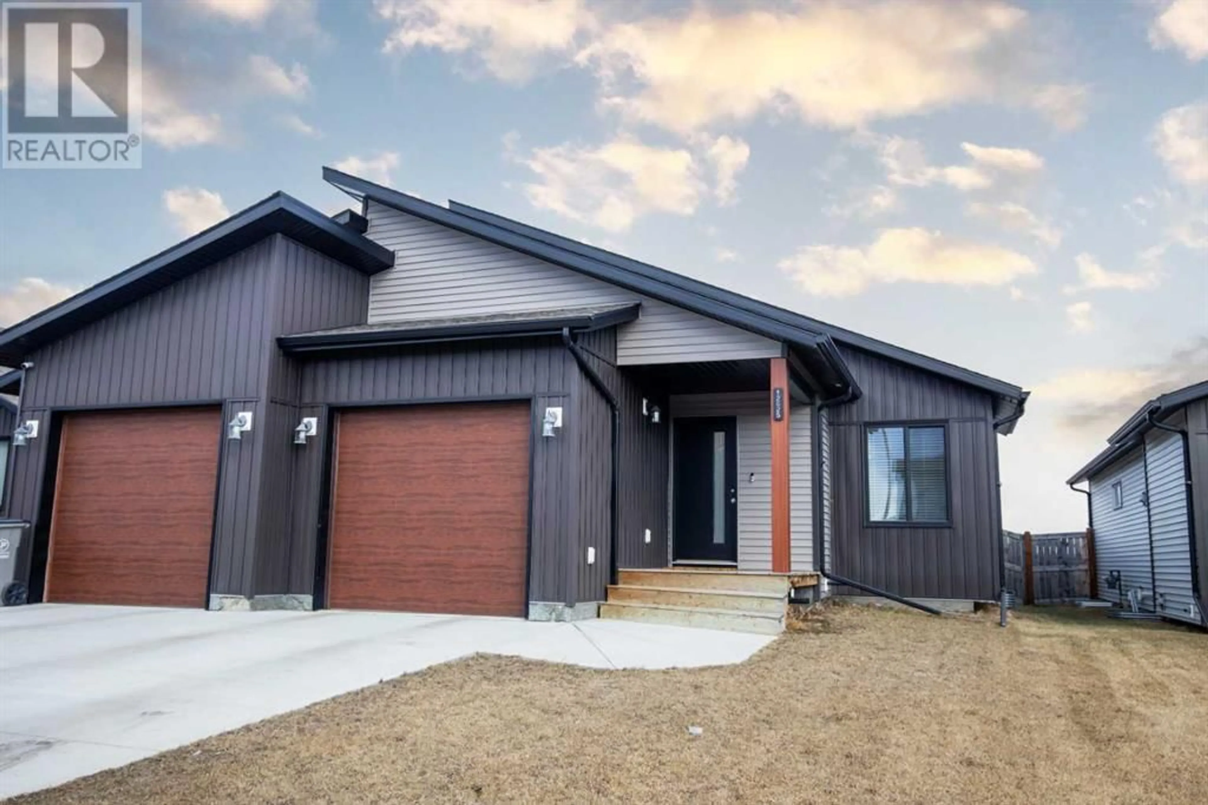 Home with brick exterior material for 12625 102A Street, Grande Prairie Alberta T8V4T7