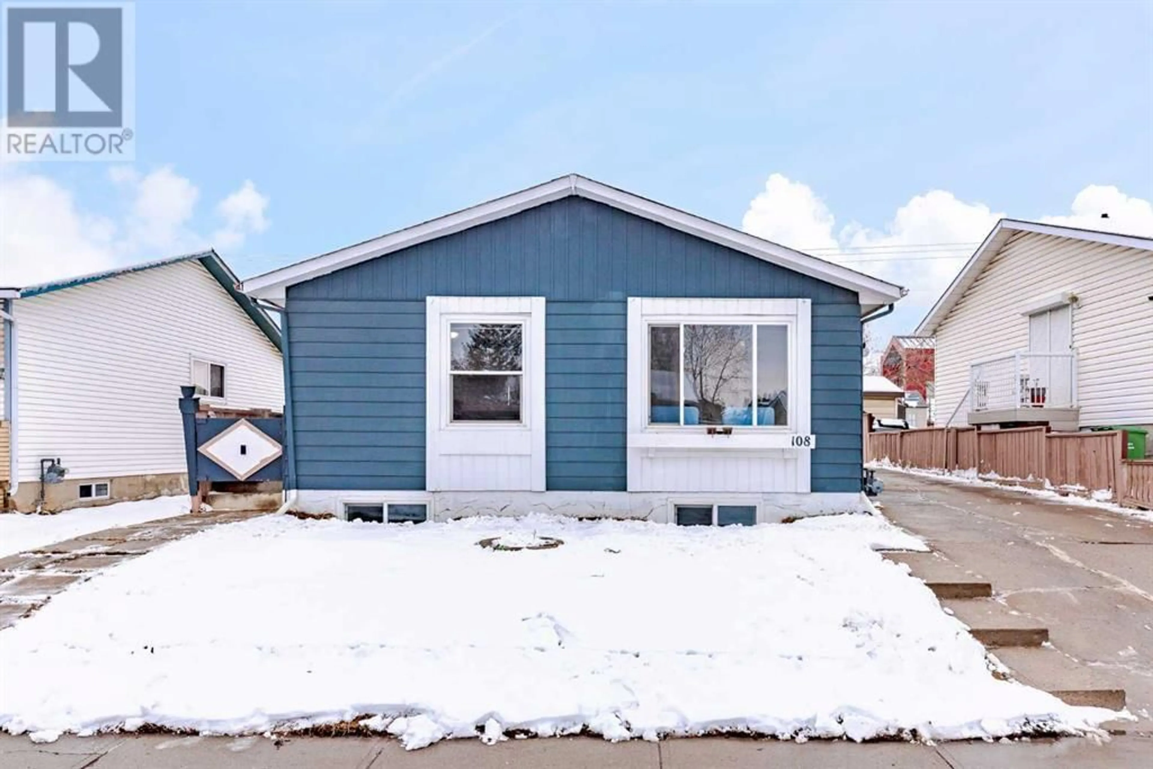 Frontside or backside of a home for 108 Whitaker Close NE, Calgary Alberta T1Y5K3