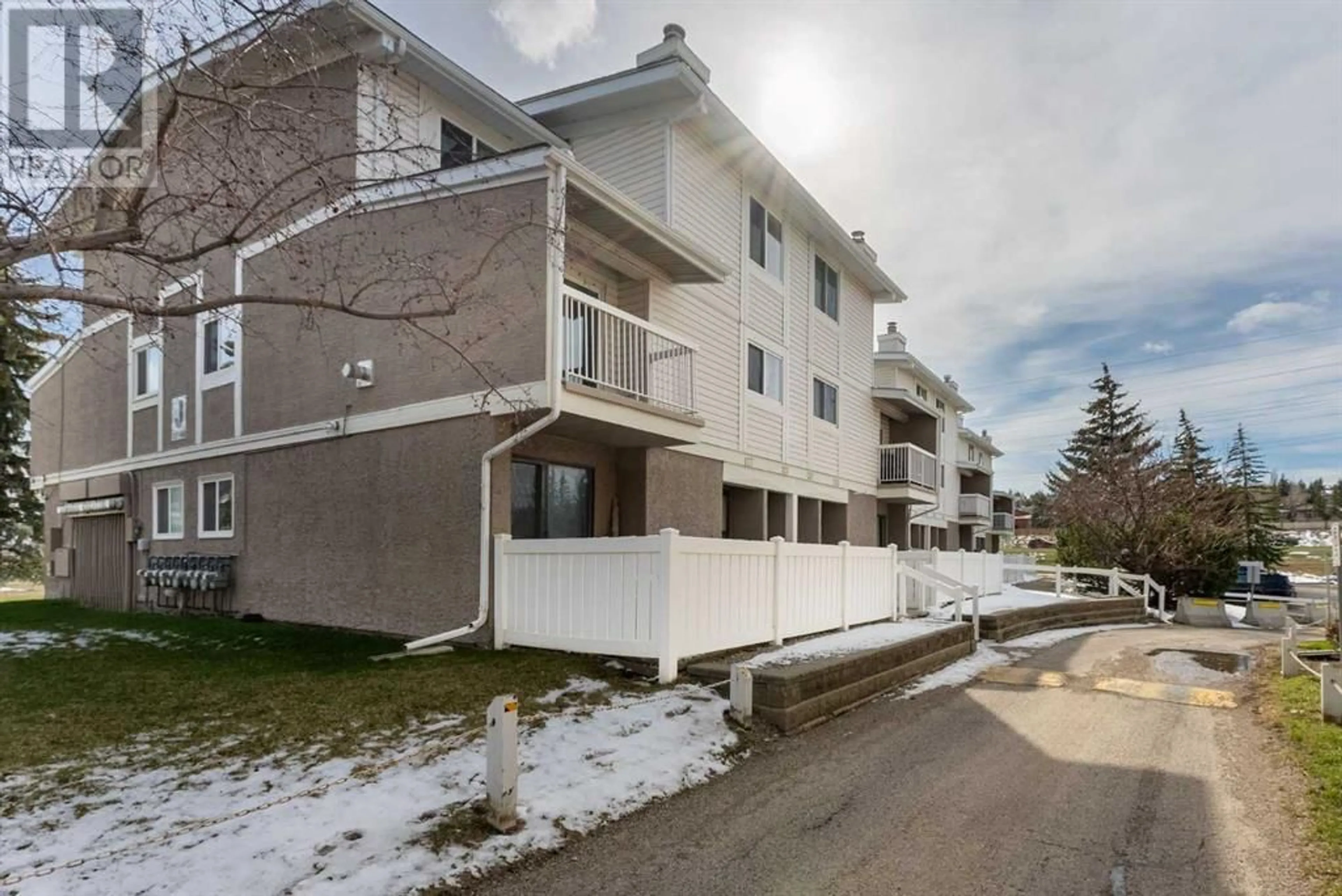 A pic from exterior of the house or condo for 128 3015 51 Street SW, Calgary Alberta T3E6N5