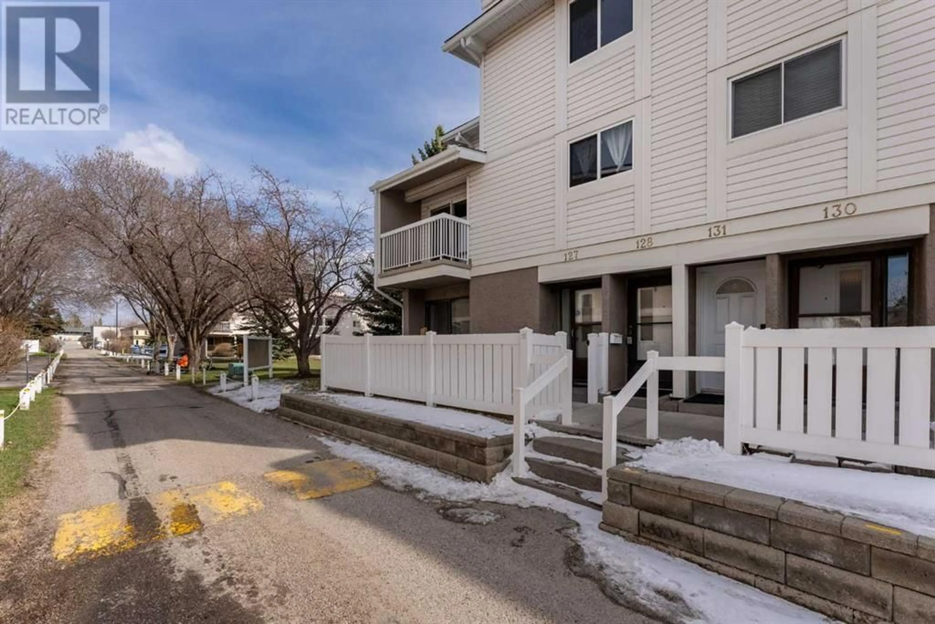 A pic from exterior of the house or condo for 128 3015 51 Street SW, Calgary Alberta T3E6N5