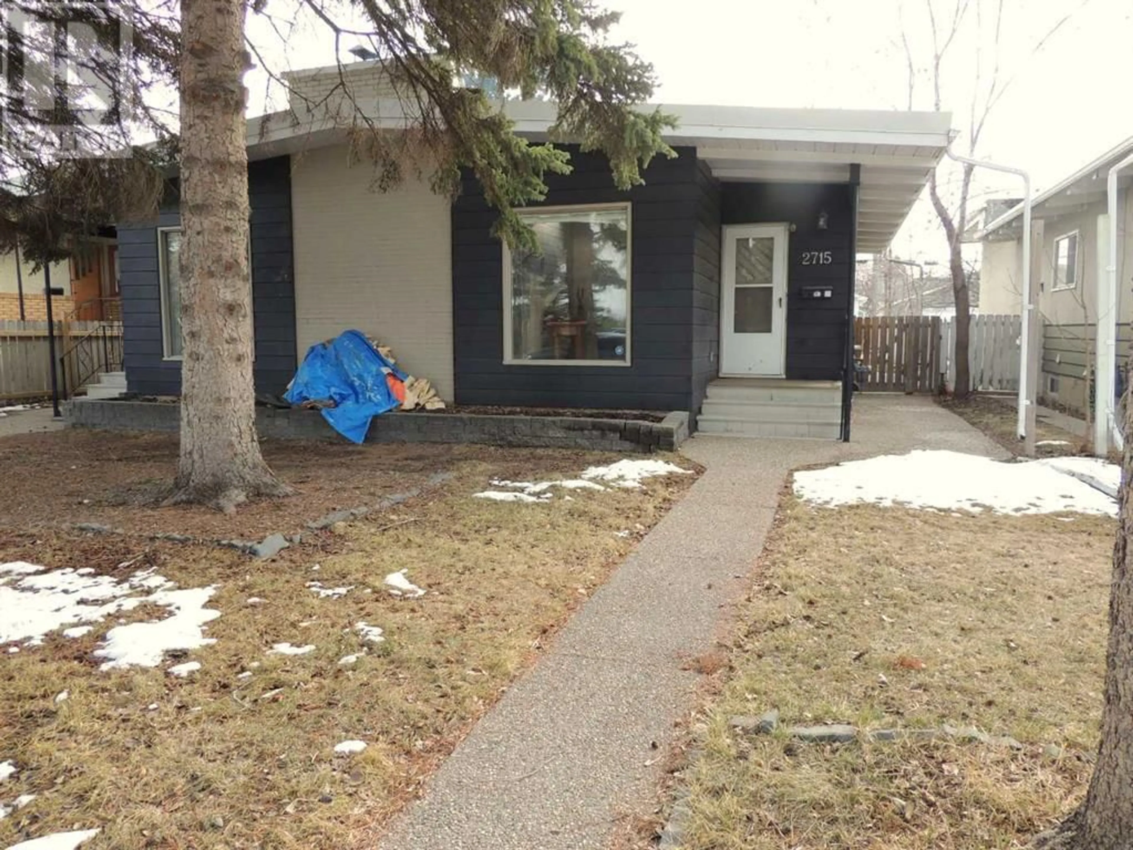A pic from exterior of the house or condo for 2715 Canmore Road NW, Calgary Alberta T2M4J6