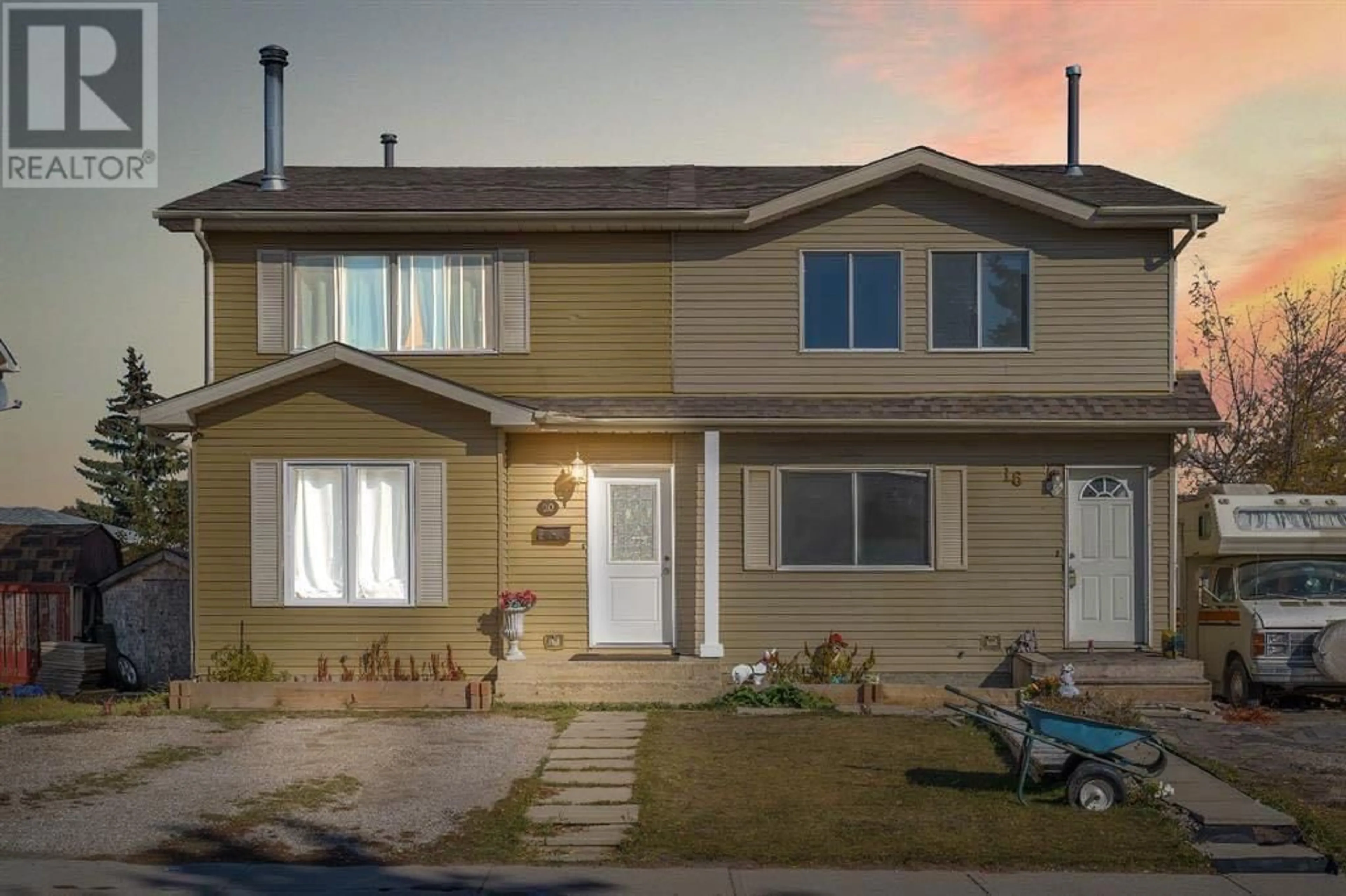 Frontside or backside of a home for 20 Falshire Way NE, Calgary Alberta T3J2B4