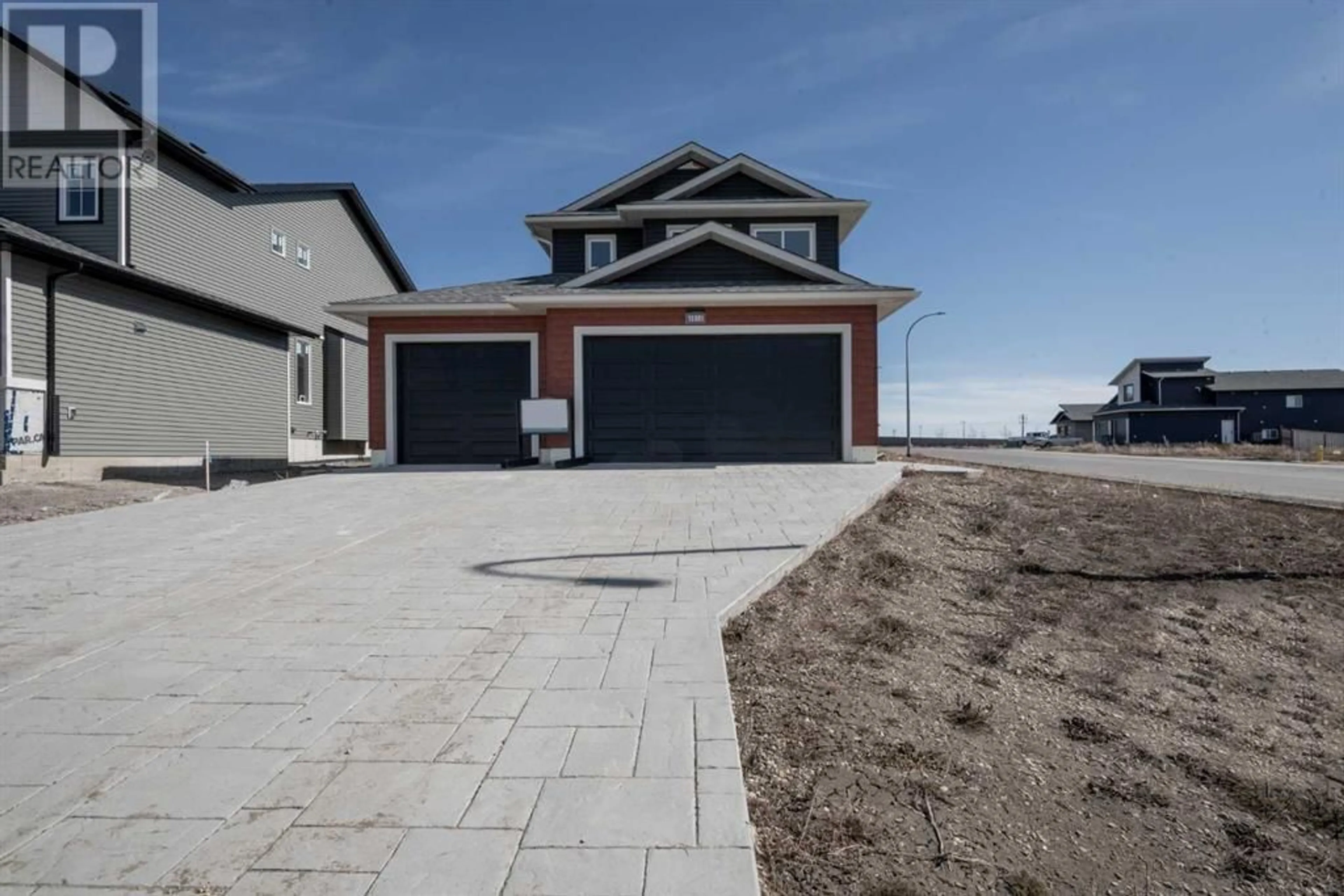 Frontside or backside of a home for 13301 106 Street, Grande Prairie Alberta T8X0W5