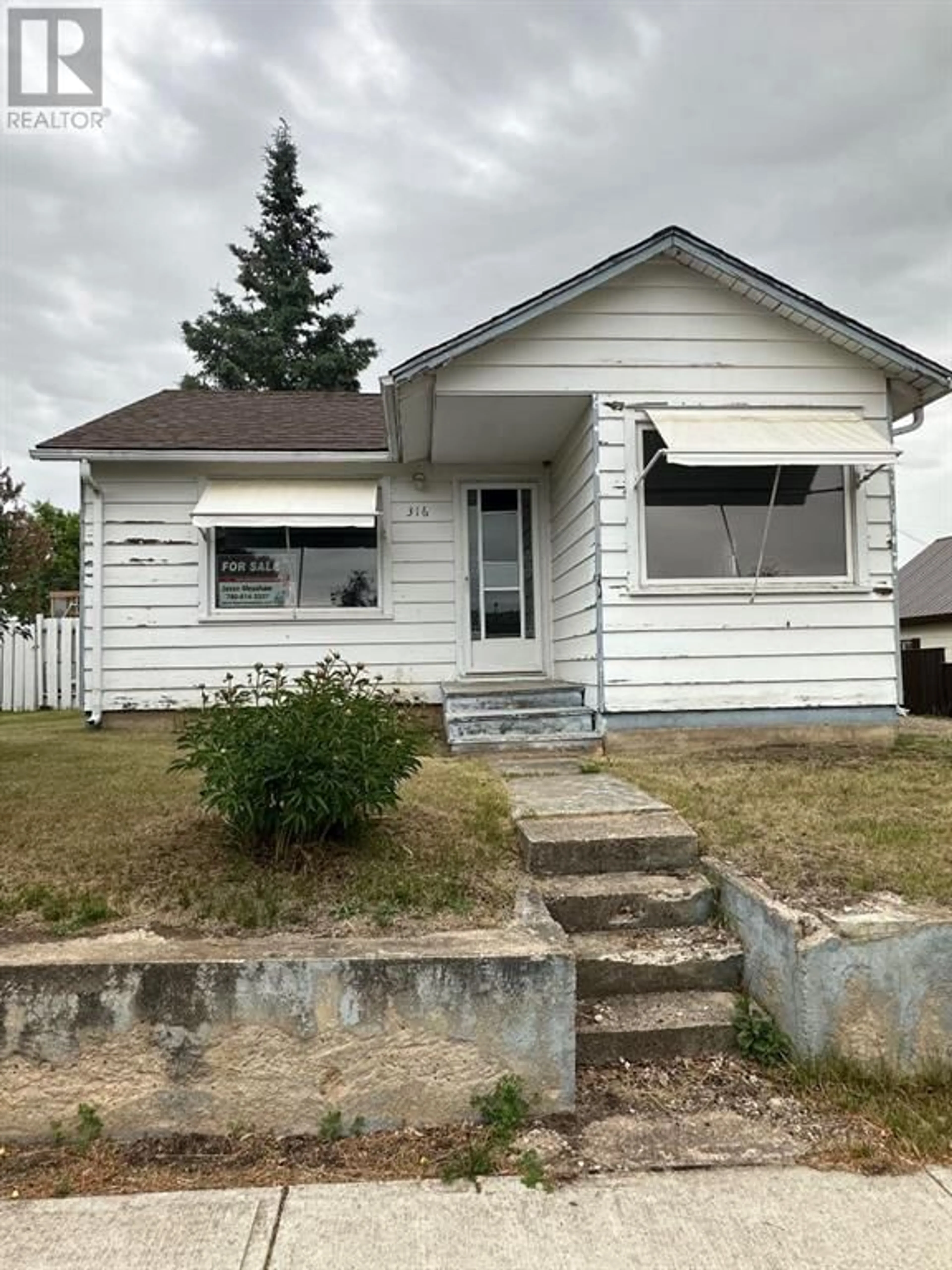 Frontside or backside of a home for 316 6 Avenue SE, Manning Alberta T0H2M0