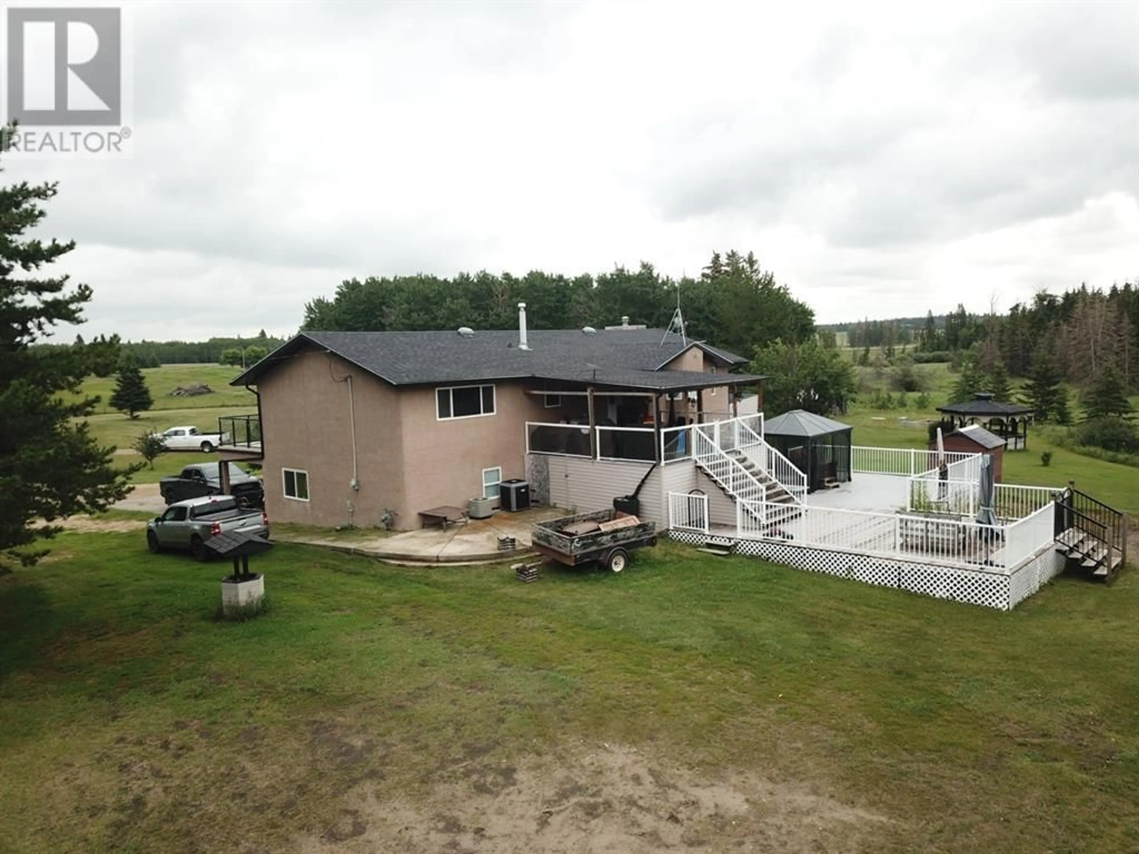 Frontside or backside of a home for 20-262065 Township Rd 422, Rural Ponoka County Alberta T4J1R3