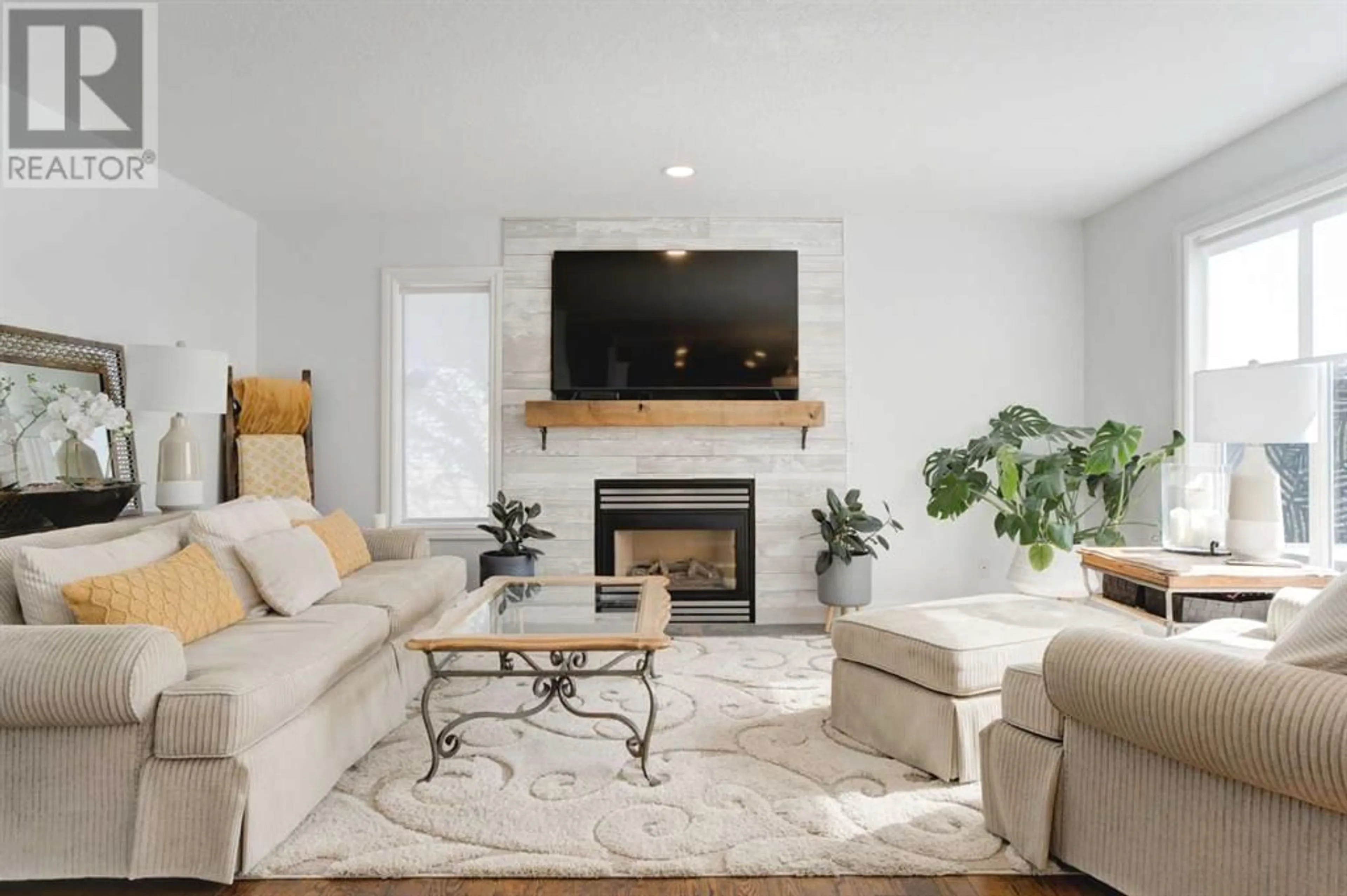 Living room for 114 West Terrace Point, Cochrane Alberta T4C1B1