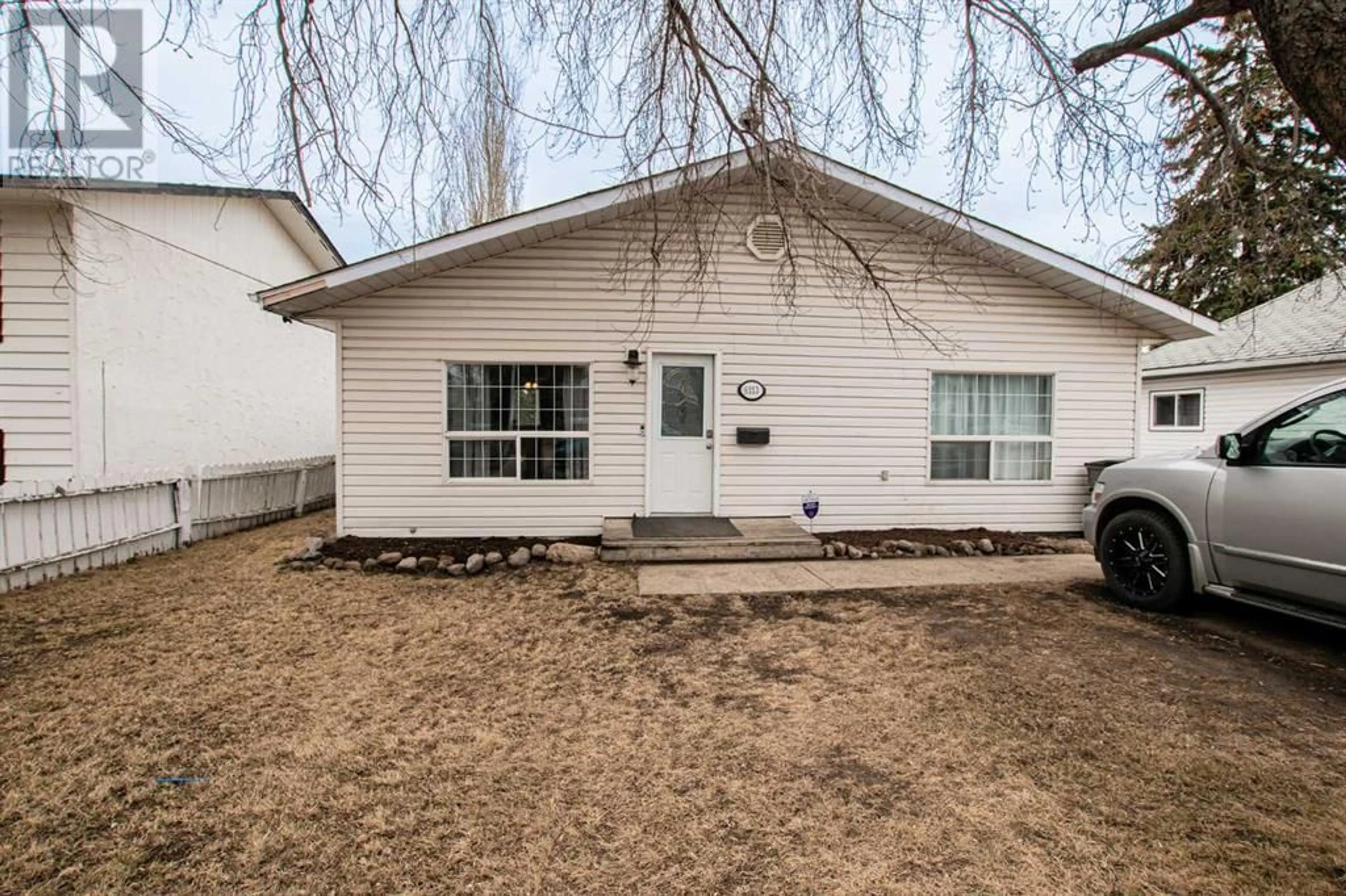 Frontside or backside of a home for 9313 101 Avenue, Grande Prairie Alberta T8V0W5