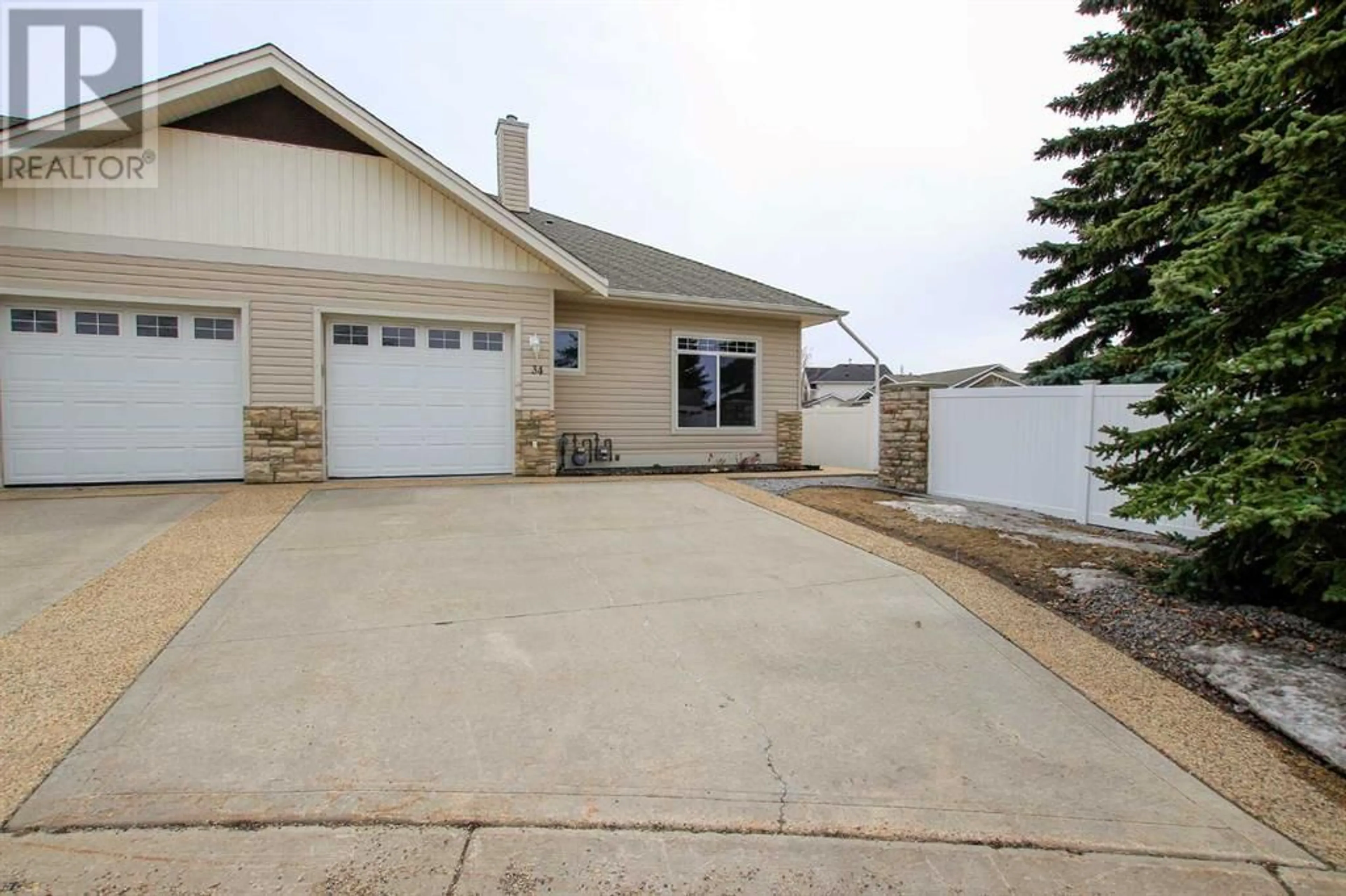 A pic from exterior of the house or condo for 34 939 Ramage Crescent, Red Deer Alberta T4P3Z9