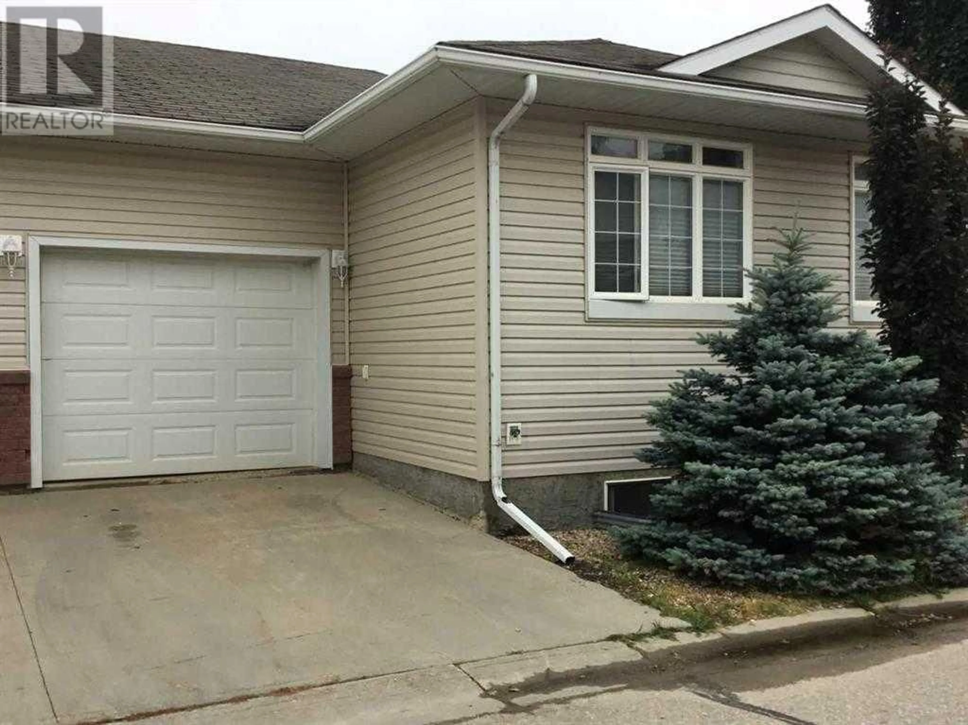 A pic from exterior of the house or condo for 137 116 6 Avenue NE, Slave Lake Alberta T0G2A2