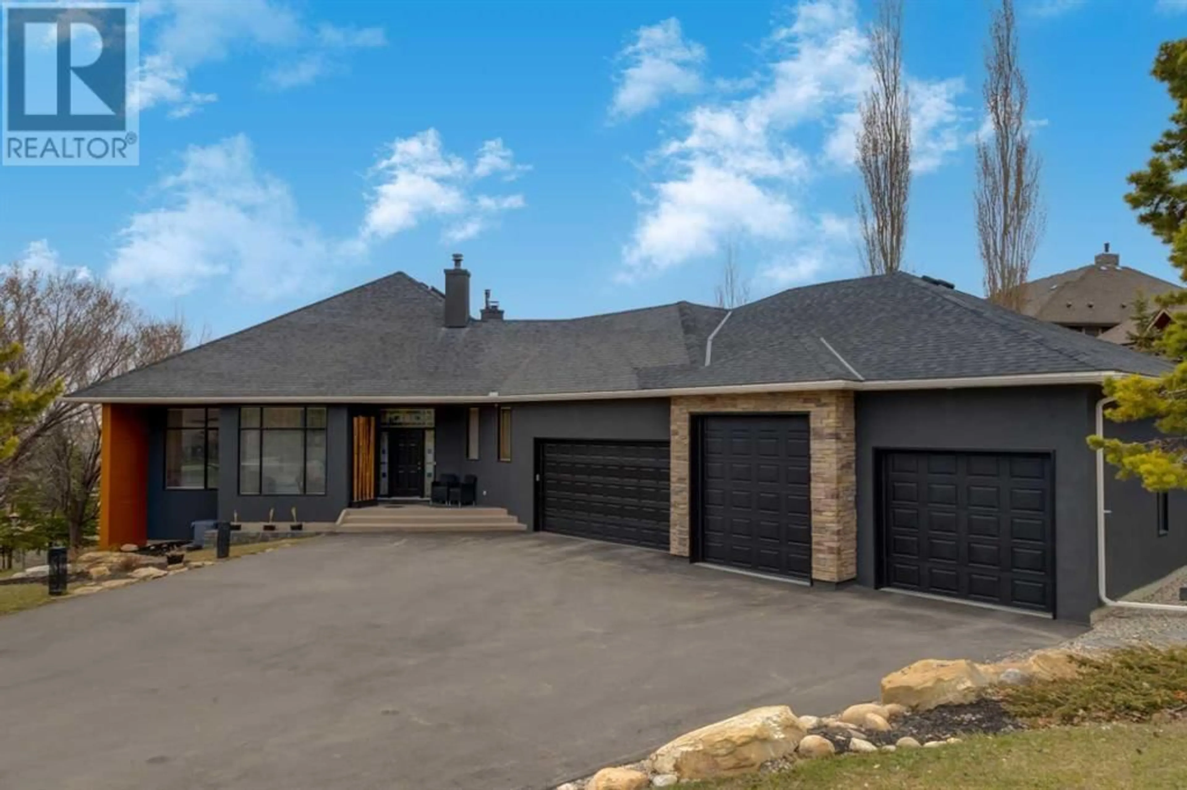 Frontside or backside of a home for 34 Elveden Drive SW, Calgary Alberta T3H2X4