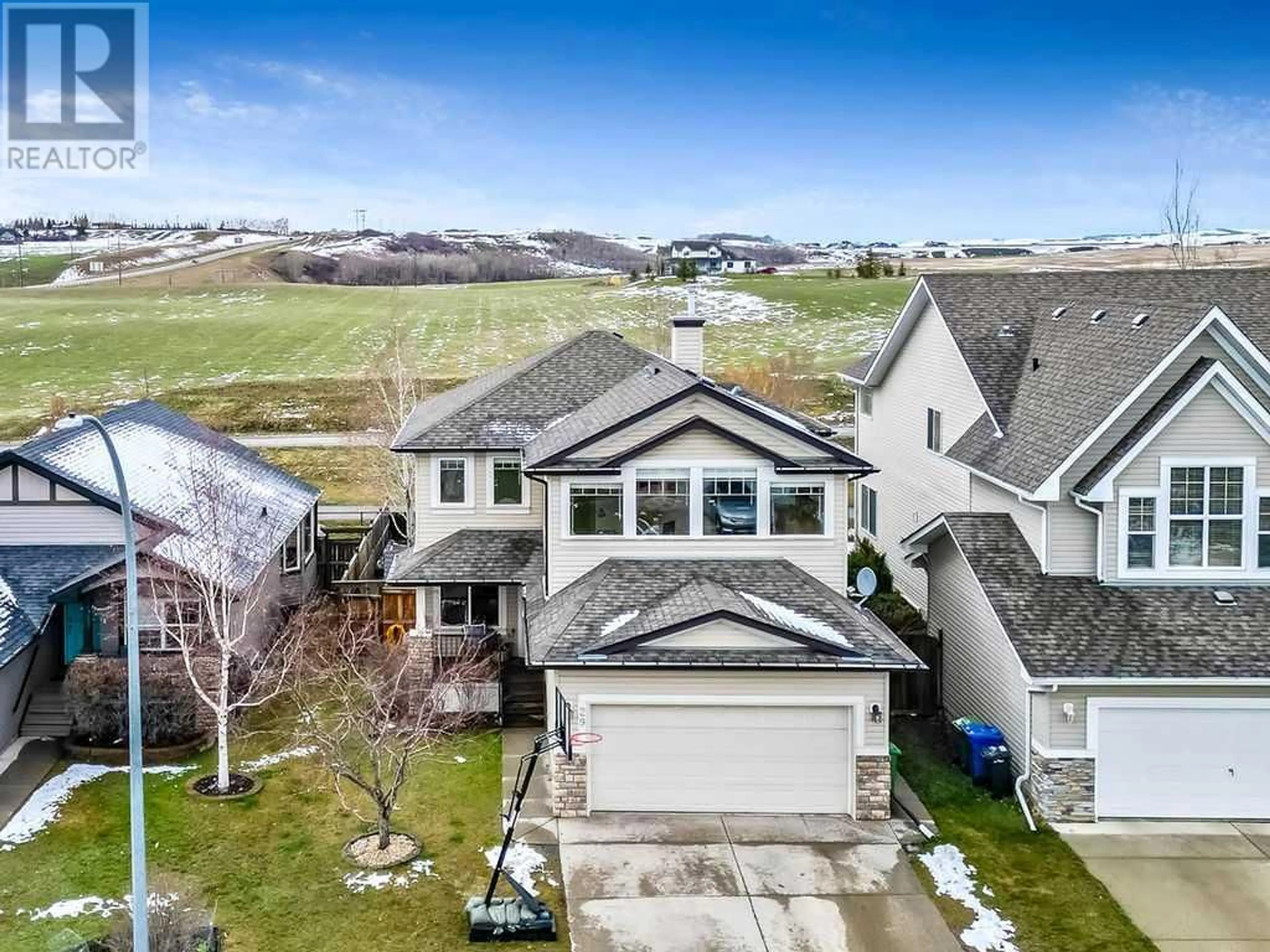 Frontside or backside of a home for 29 Westmount Circle, Okotoks Alberta T1S0B5