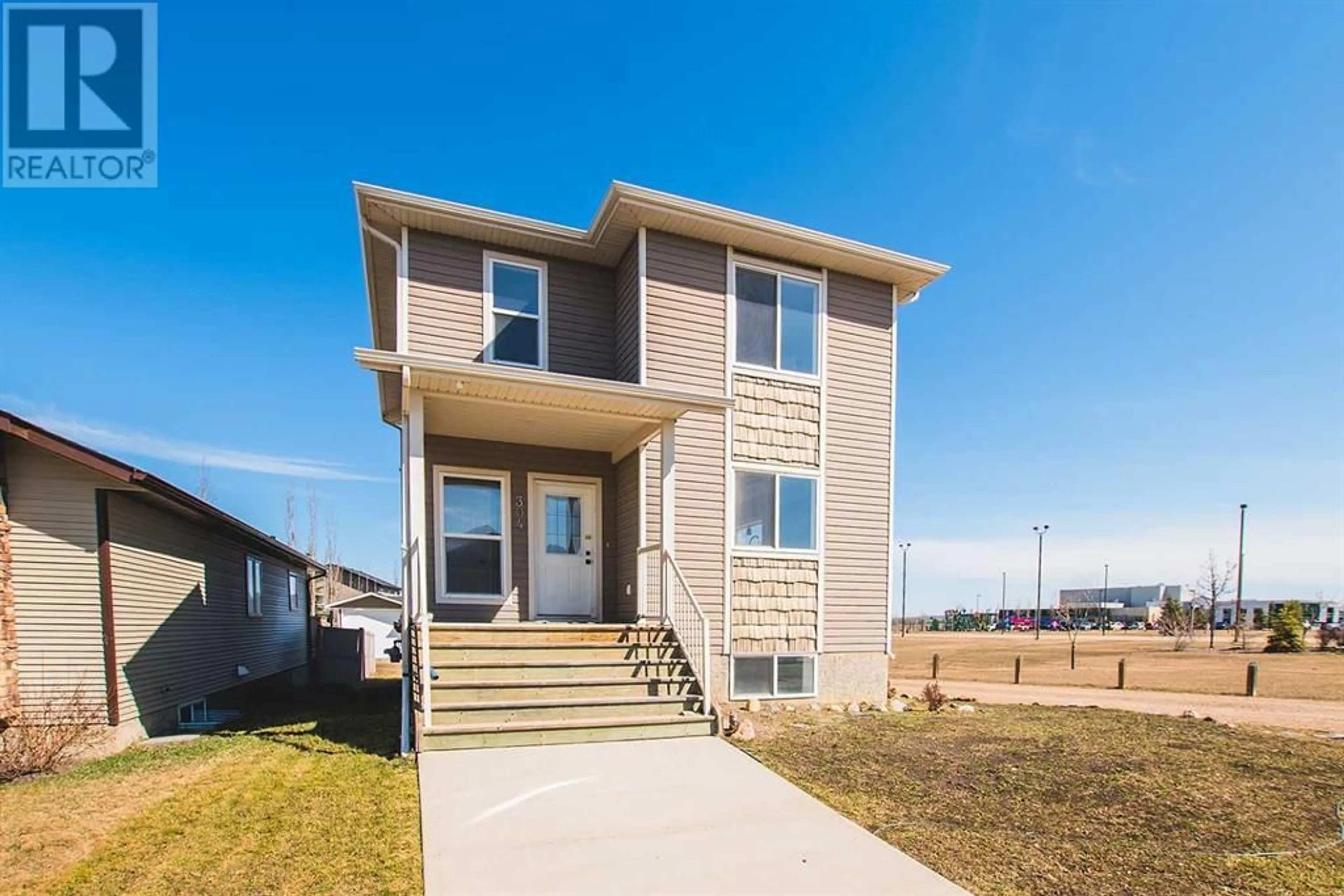 Frontside or backside of a home for 304 Timothy Drive, Red Deer Alberta T4P0K8