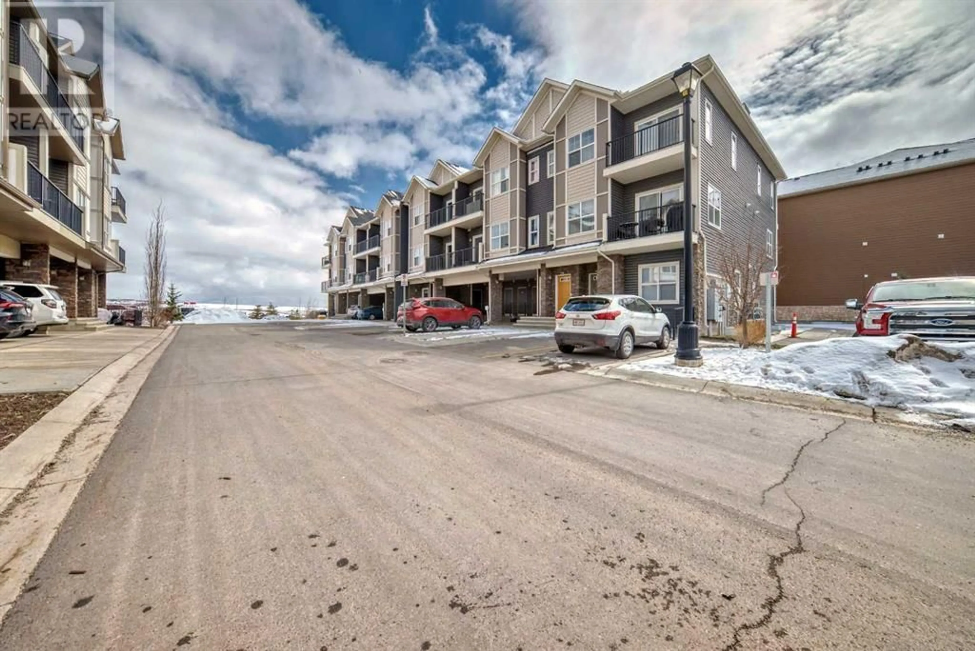 A pic from exterior of the house or condo for 401 250 Fireside View, Cochrane Alberta T4C2M2