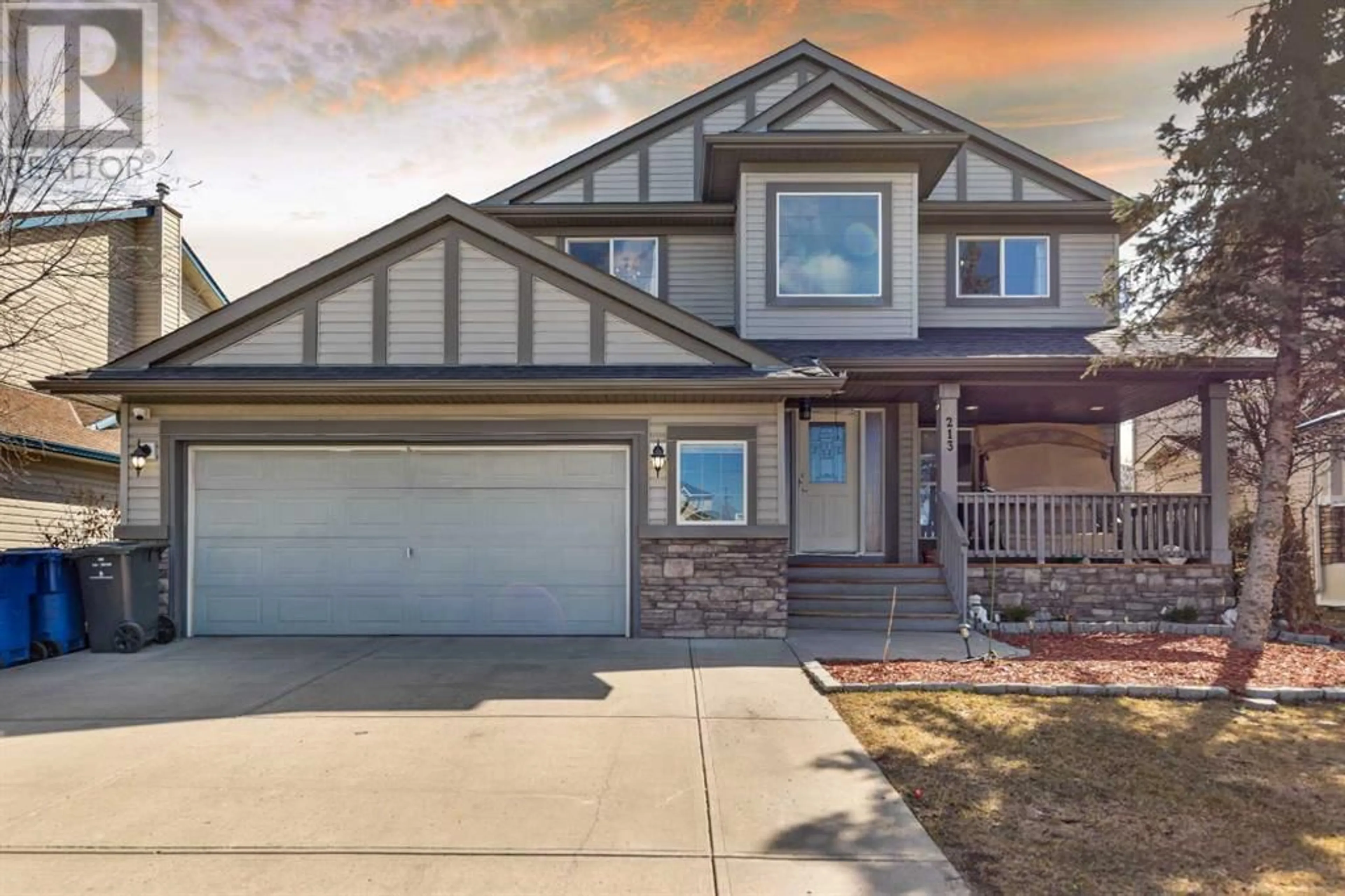 Frontside or backside of a home for 213 WEST CREEK Drive, Chestermere Alberta T1X1K7