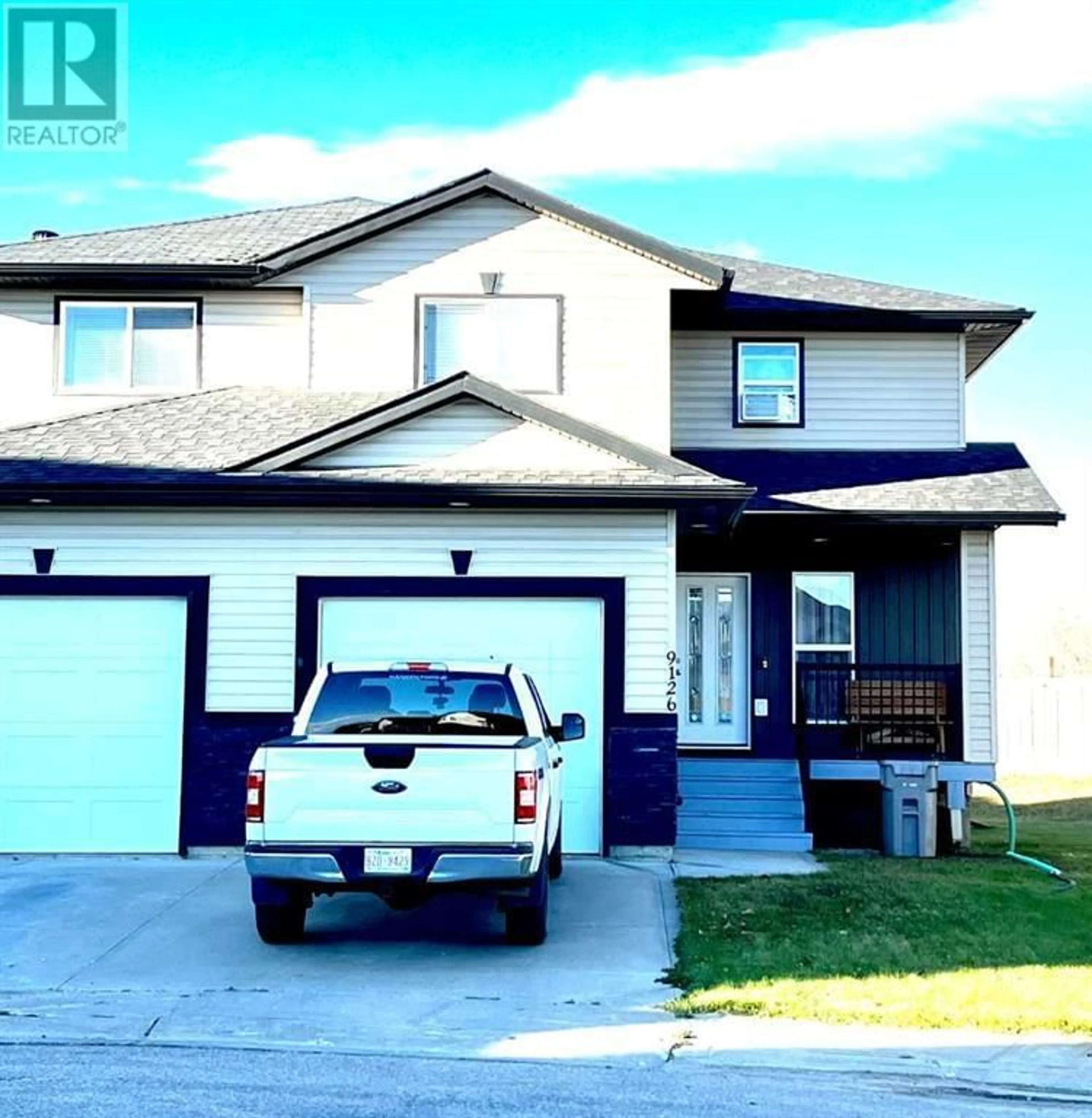 Frontside or backside of a home for 9126 131 Avenue, Grande Prairie Alberta T8X0A9